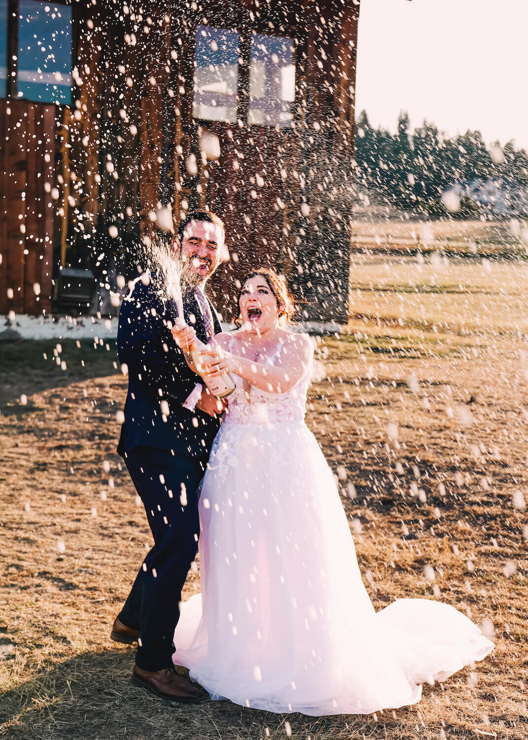 denver co wedding photography - copule popping champagne