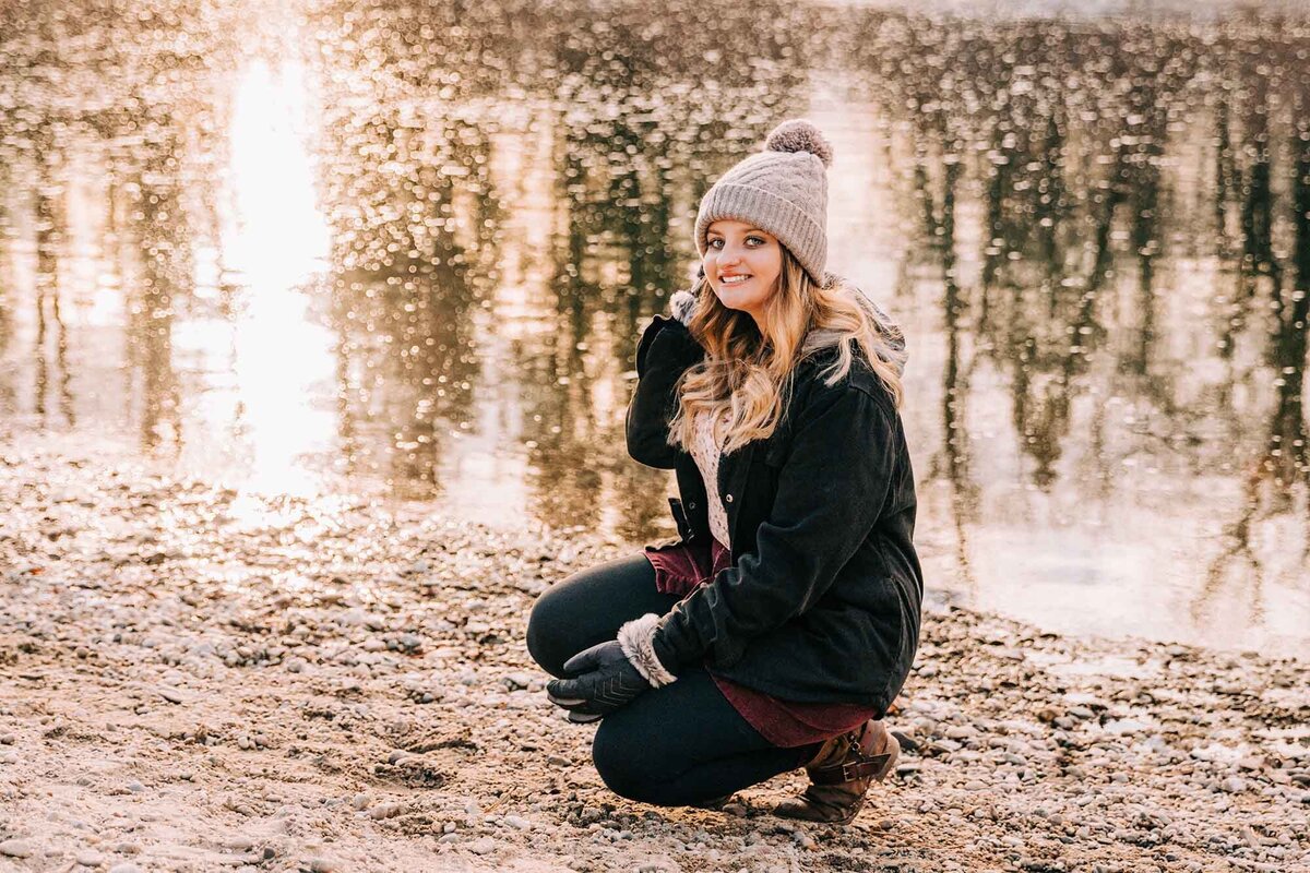 Senior photo of girl near Clark Fork River at Council Grove State Park, Missoula