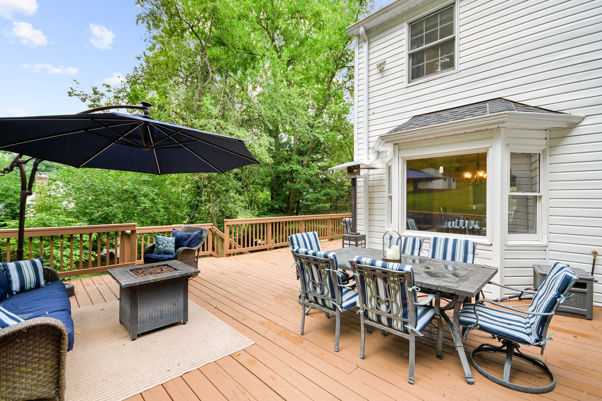 Outdoor patio with seating area and dining