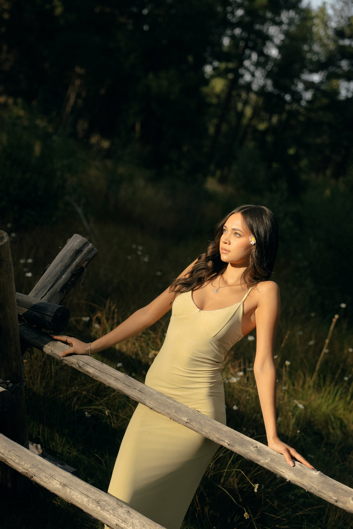 Black and White Senior Portrait in Mountain Landscape During Golden Hour