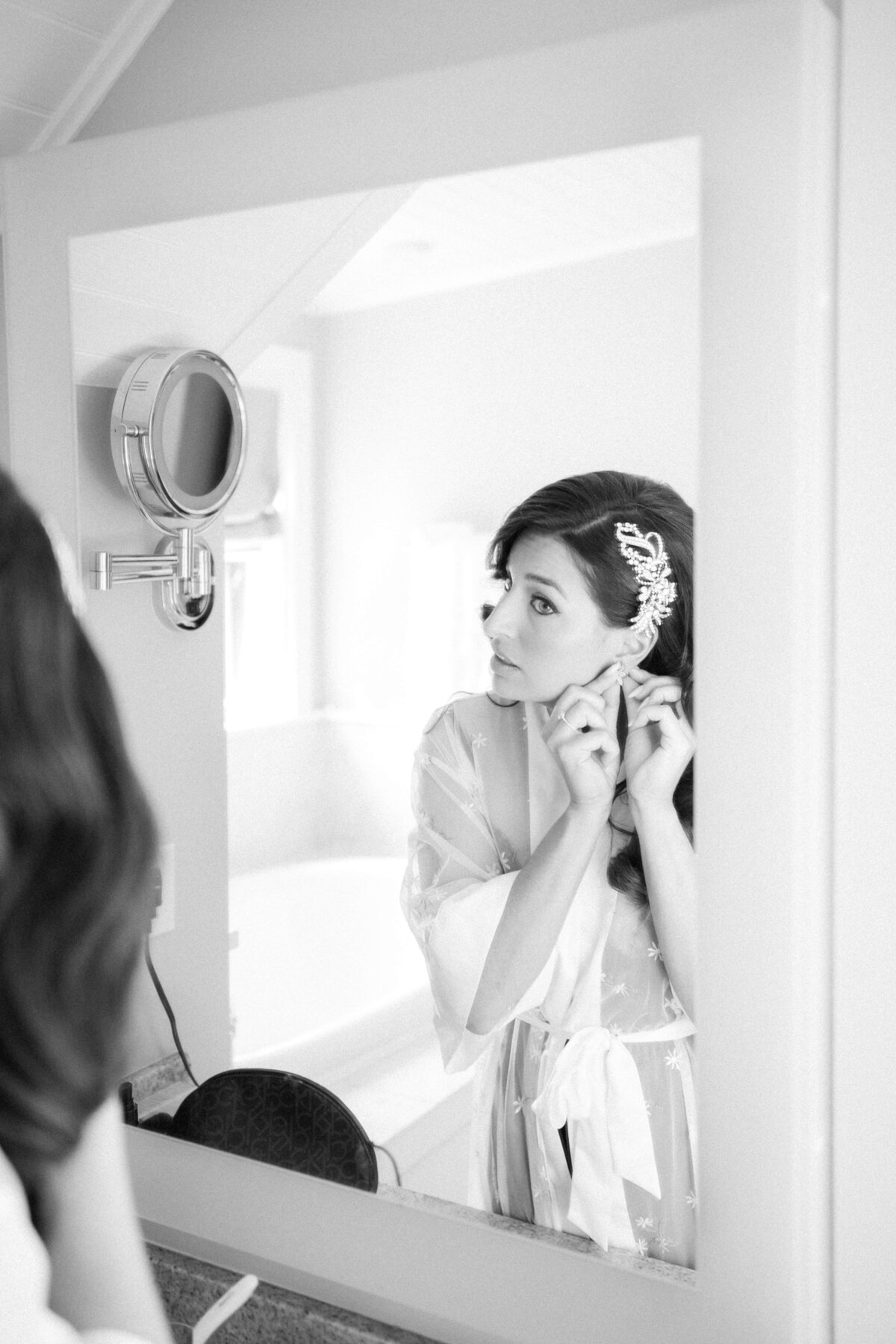 bride looking in mirror at castle hill inn newport RI
