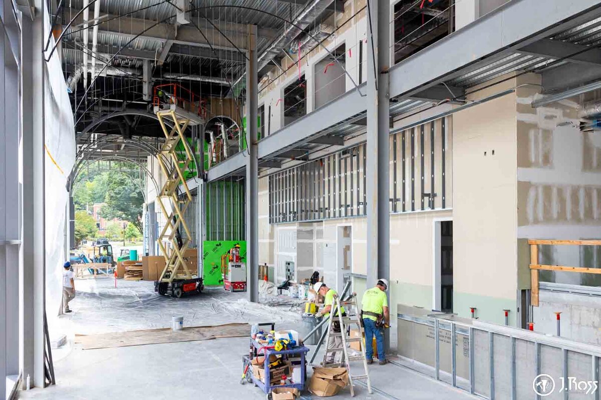 Interior shot of the J.Ross team finishing commercial drywall in the new 62,000 sq ft ETSU Academic Building.