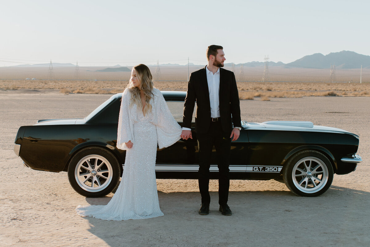 Las Vegas elopement with vintage car at sunrise