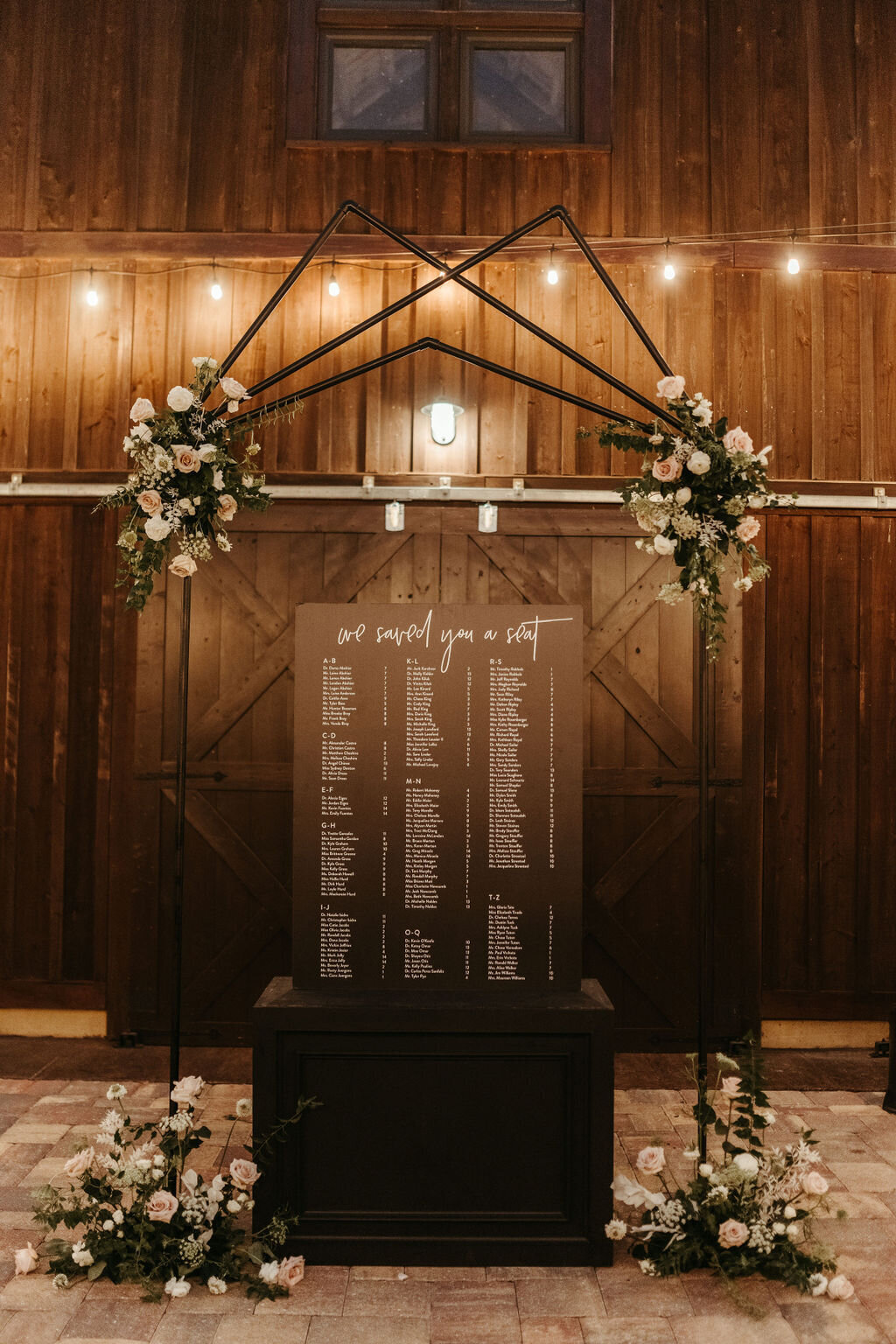 19 - Mision Lago Estate Wedding Courtyard Cocktail Hour Seating Chart - Tampa Bay Wedding Planner