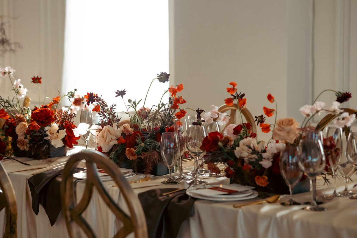 "Bride and groom celebrate their elegant luxury wedding at the historic Cottonwood Hotel in Omaha, NE – timeless moments captured by Tori Nichole Photography. A perfect blend of sophistication, romance, and architectural charm, showcasing the couple's love story in an unforgettable setting.
