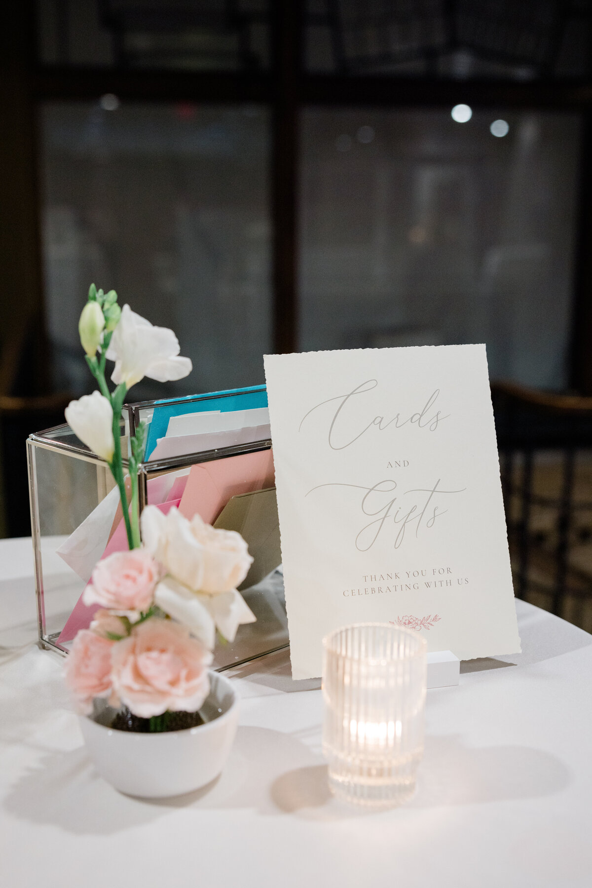 Intimate-blush-blooms-and-greenery-transform-this-gift-table