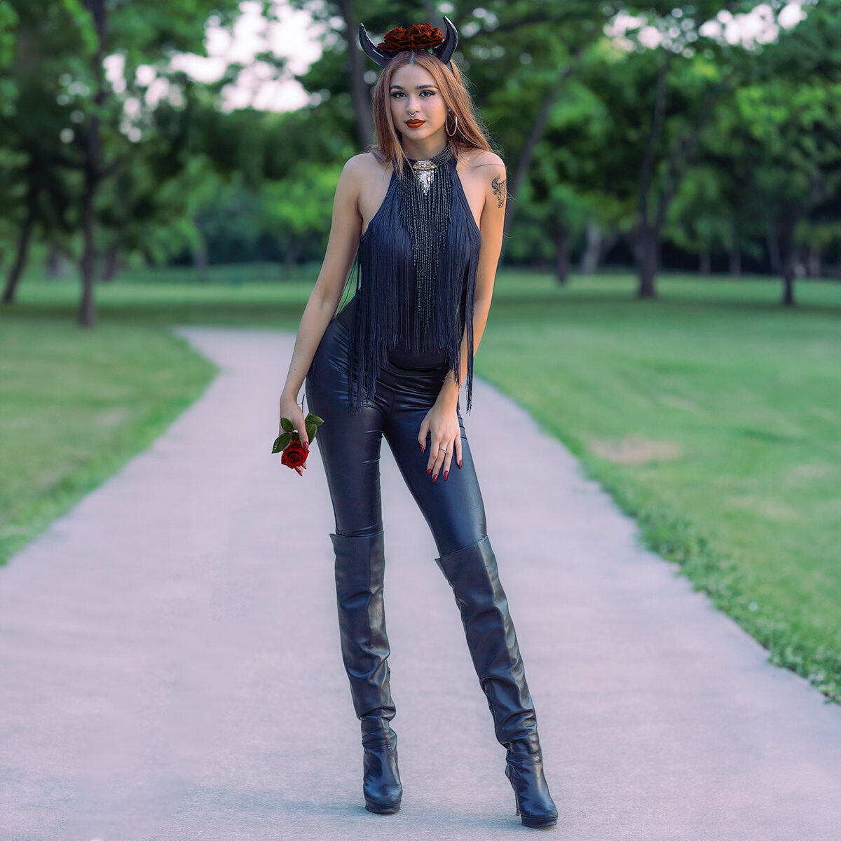 PAULA MARIA TAURUS STANDING ON SIDEWALK