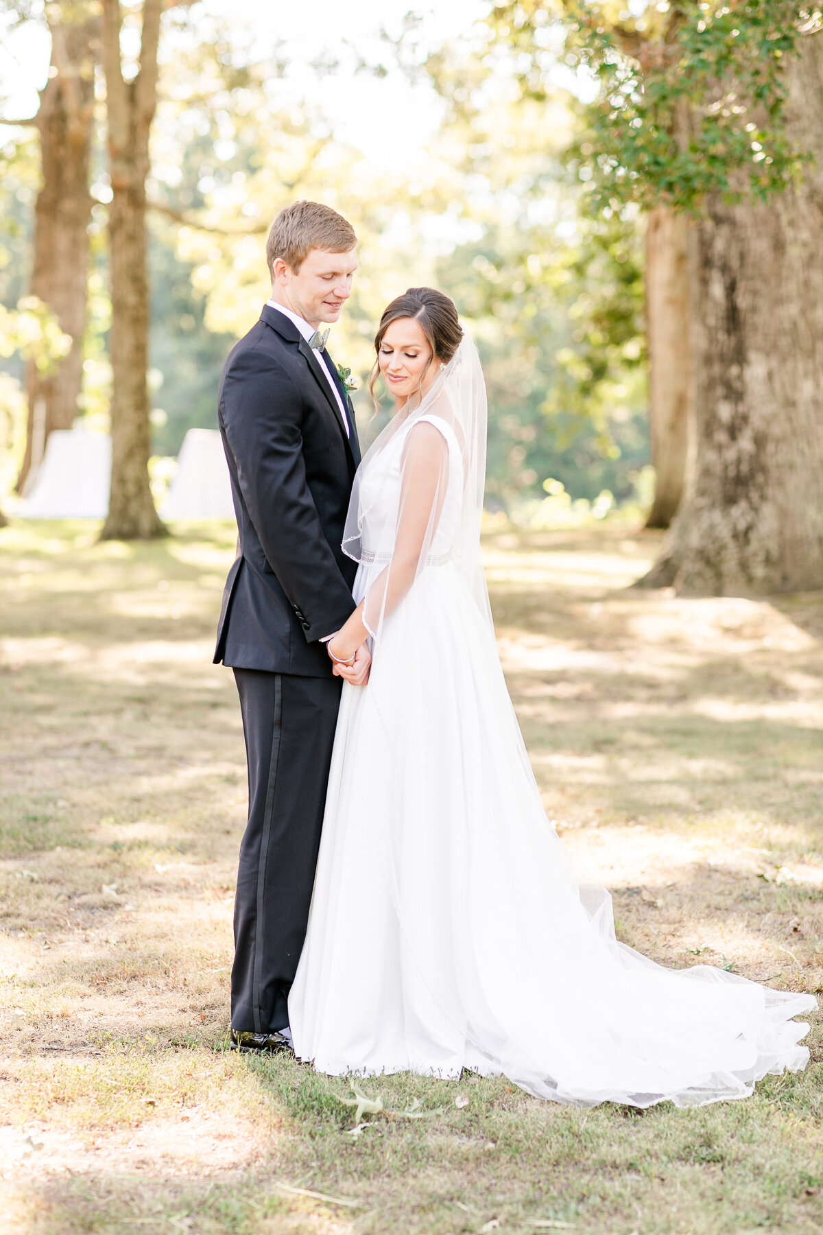 Eastern Shore, Va Bride and Groom holding hands.