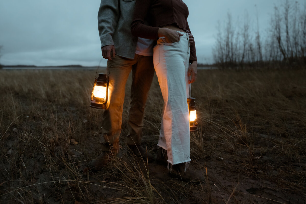 couple holding lanterns