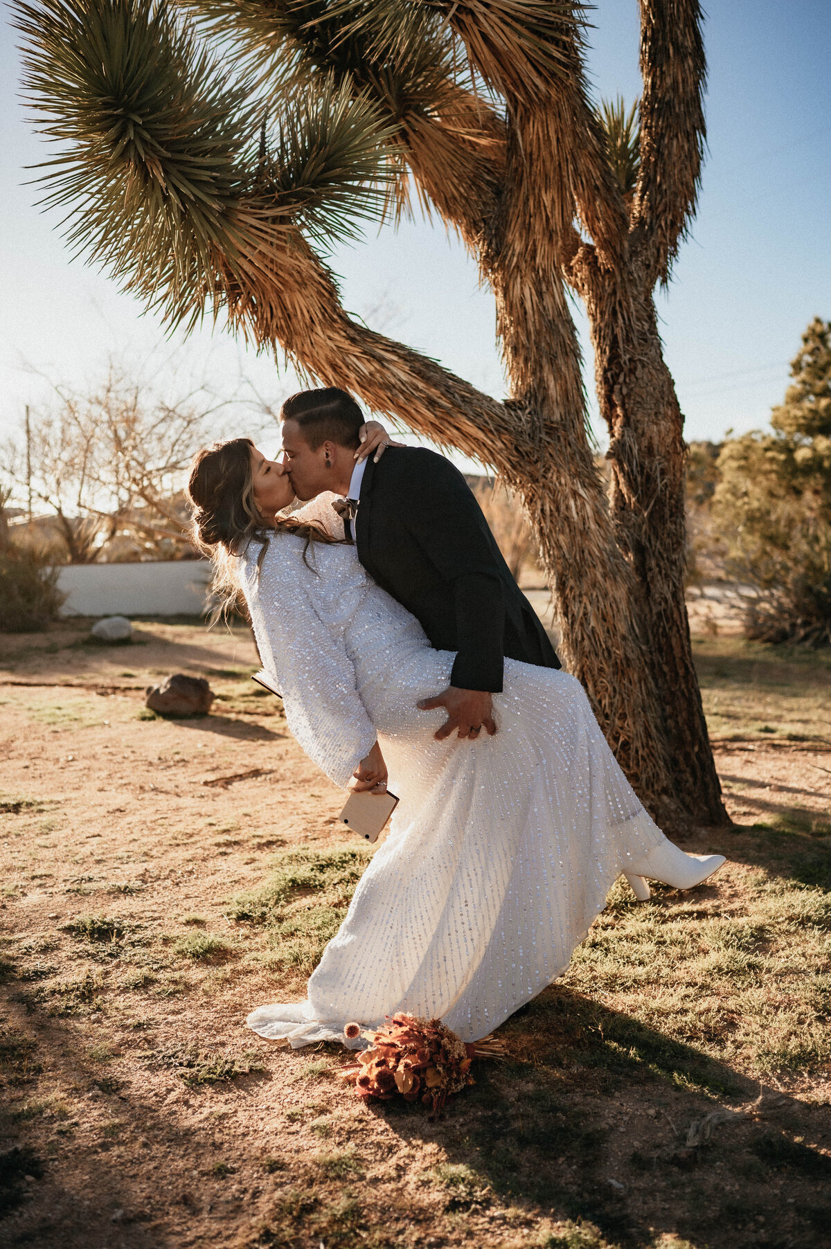 Couples elopement photograph of them outdoors kissing