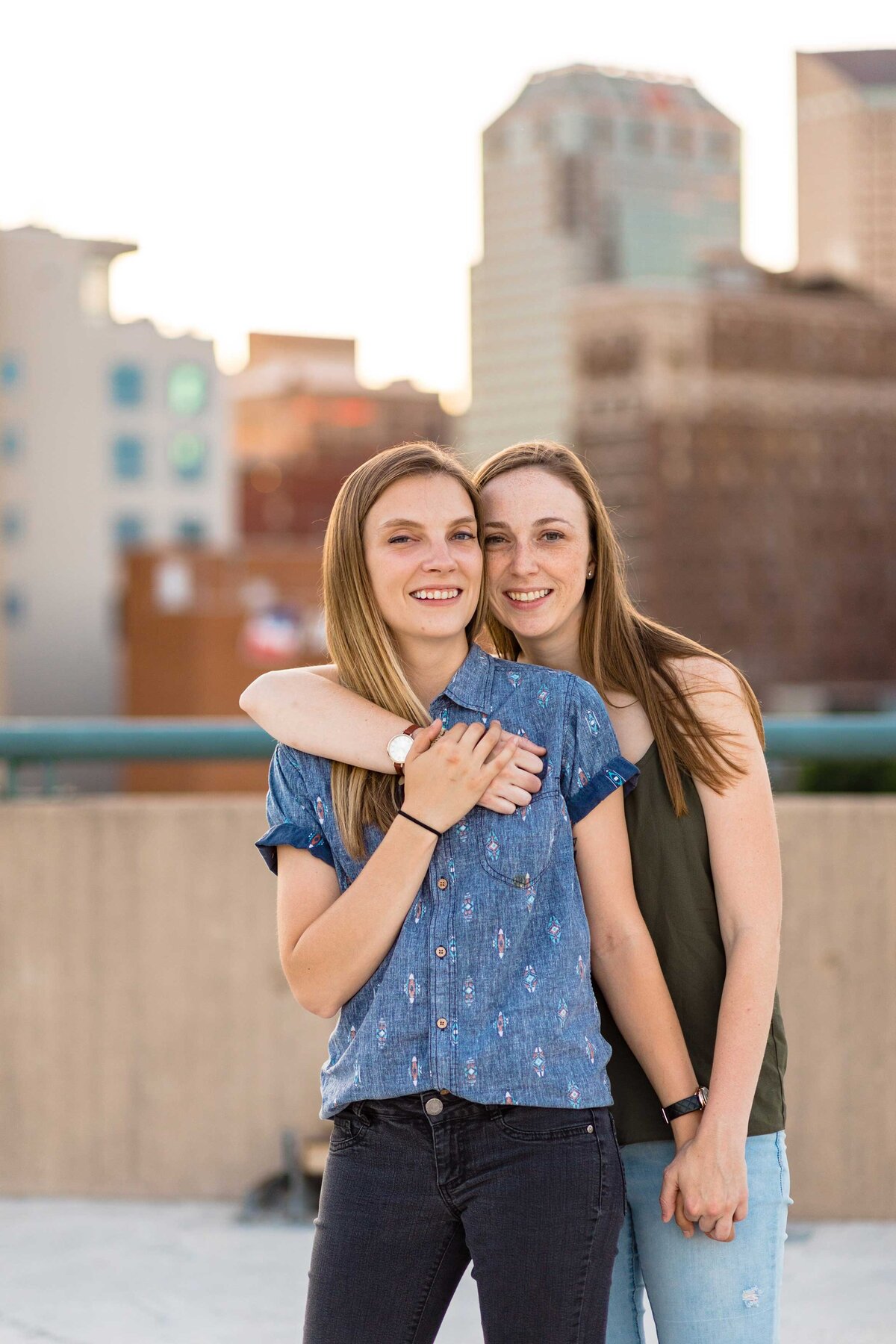 lesbian couple engagement photos in parking garage