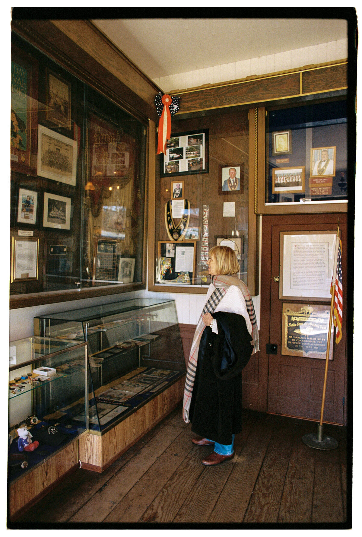 Documentary-style portrait of a woman, captured on film by Kate Winters Photography, showcasing an authentic and candid moment in Carmel, California.
