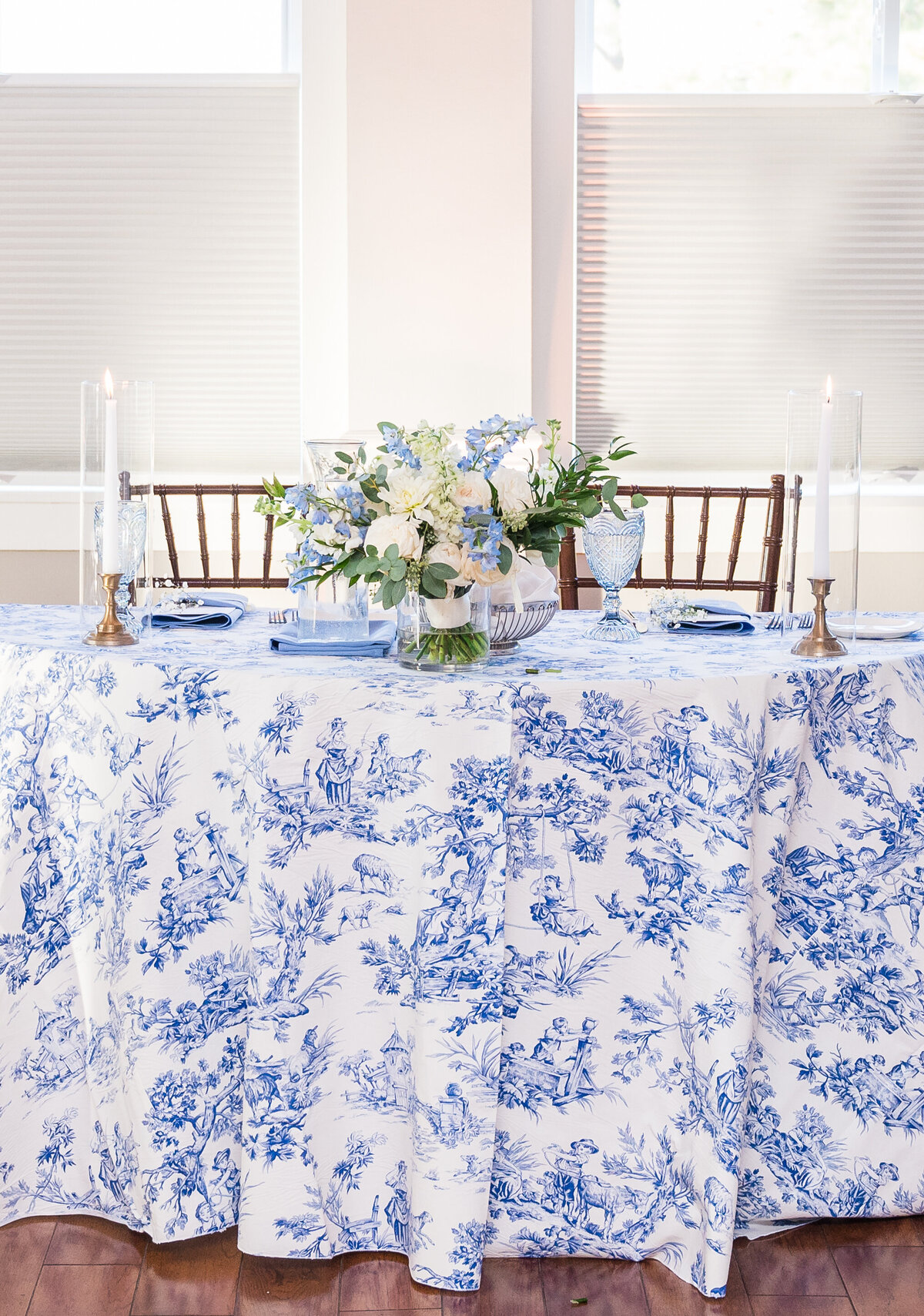 Blue and white floral design and wedding decor at Herrington on the Bay in North Beach, MD. Florist for waterfront wedding venues in Maryland.