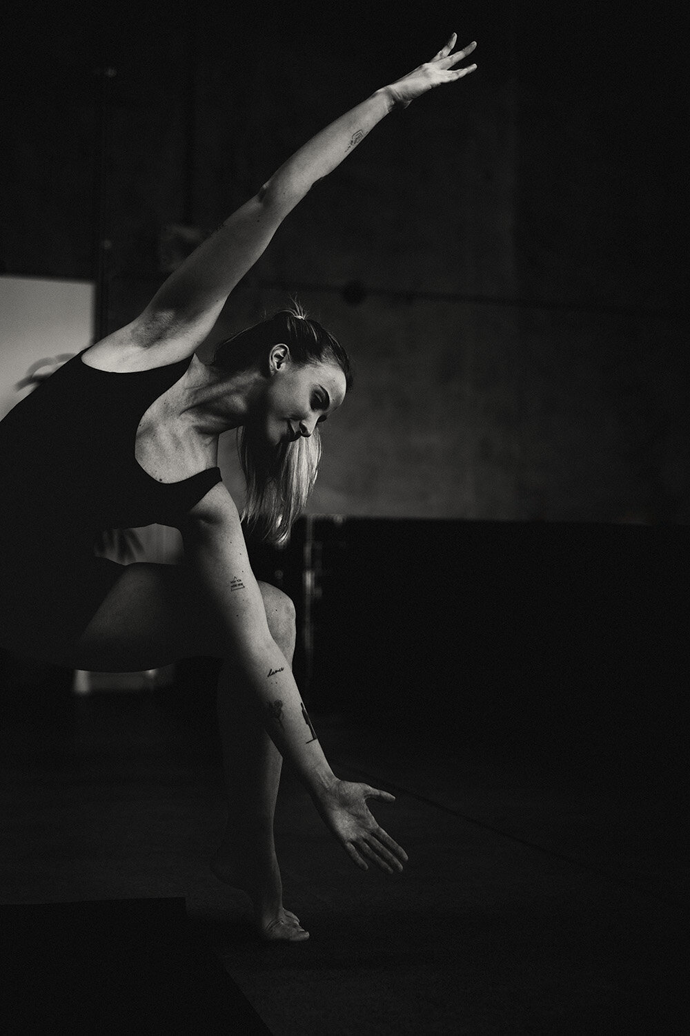 black and white lady doing yoga pose