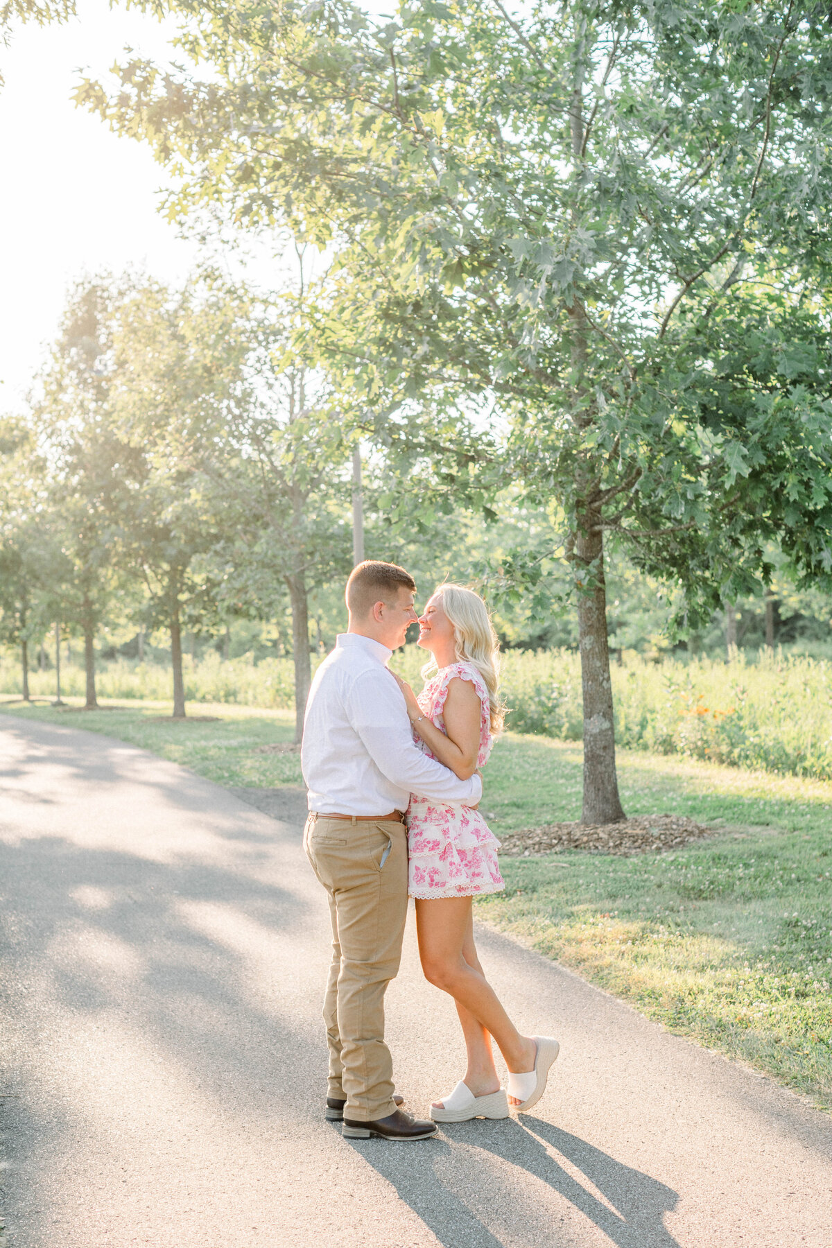 kissing photo during golden hour for an engagement session