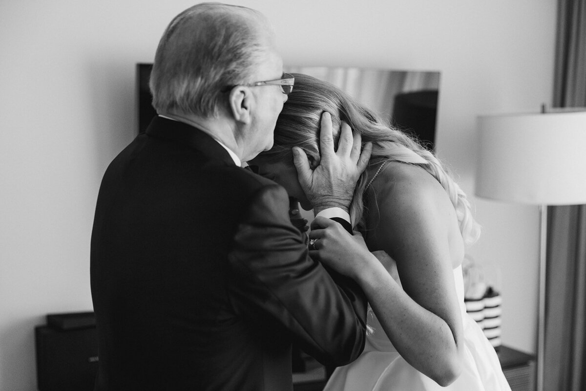 Fathers-kiss-first-look-HBIC-Weddings