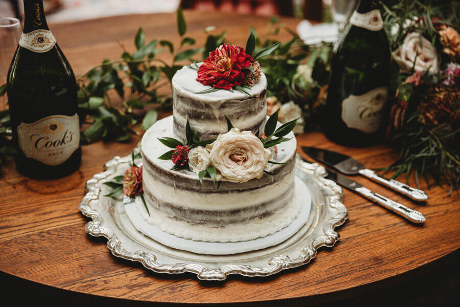 Sydnee Chaille wedding - white cake with floral pieces