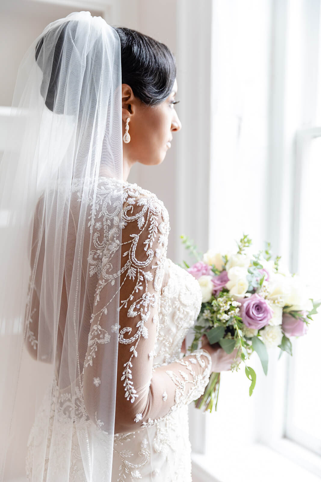 bride in wedding down with lace details