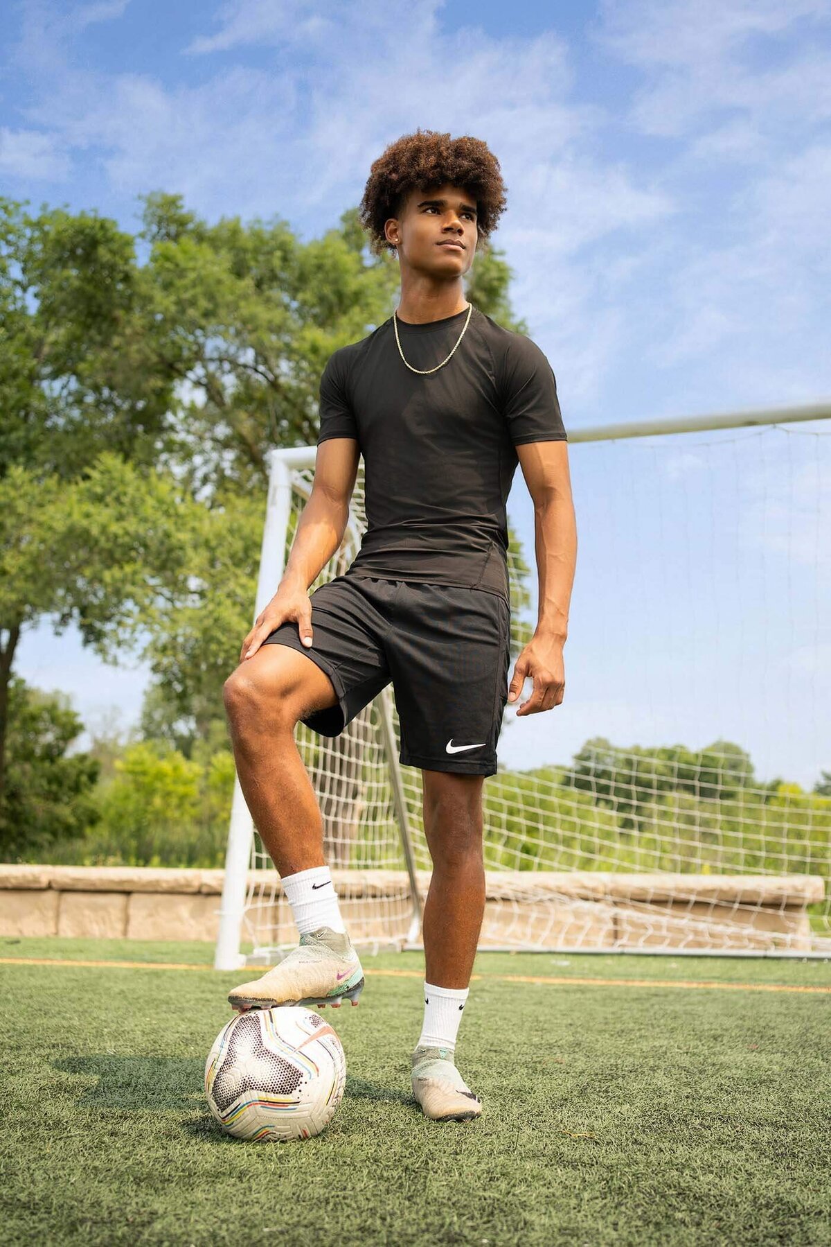 senior-sports-photos-posed-with-soccer-ball