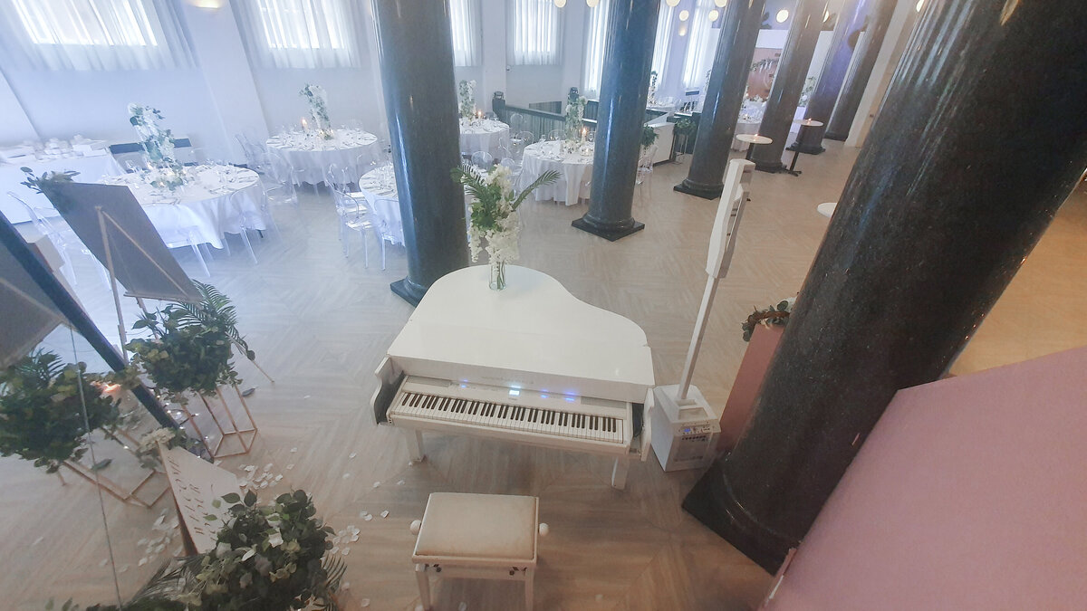white baby grand piano hire for wedding