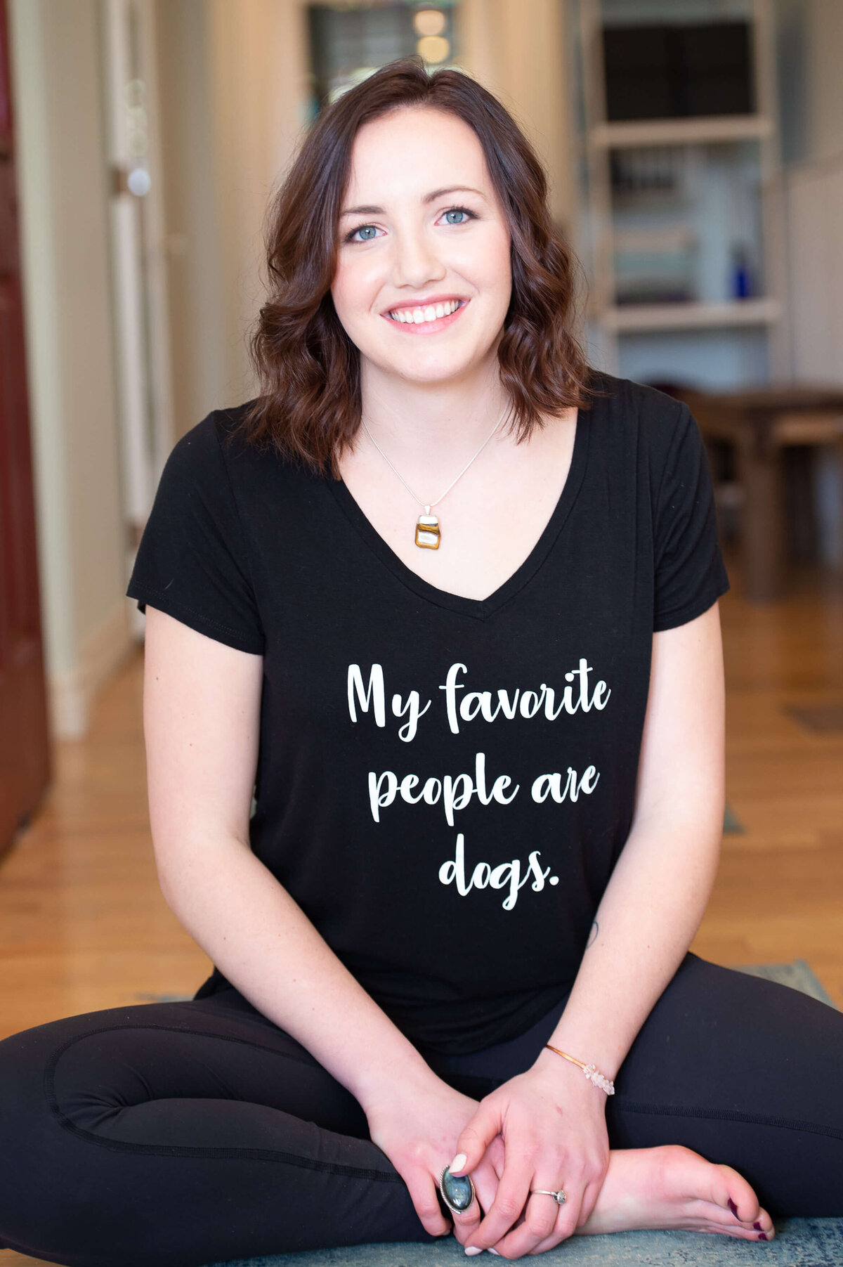 Ottawa brand photos of a yoga instructor with a funny saying on her T-shirt