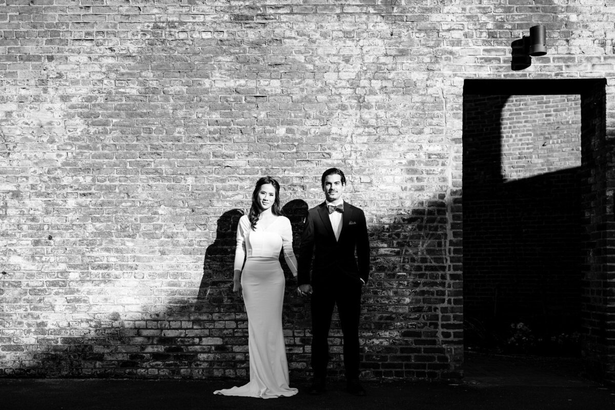elopement-couple-brooklyn-dumbo-brick-wall