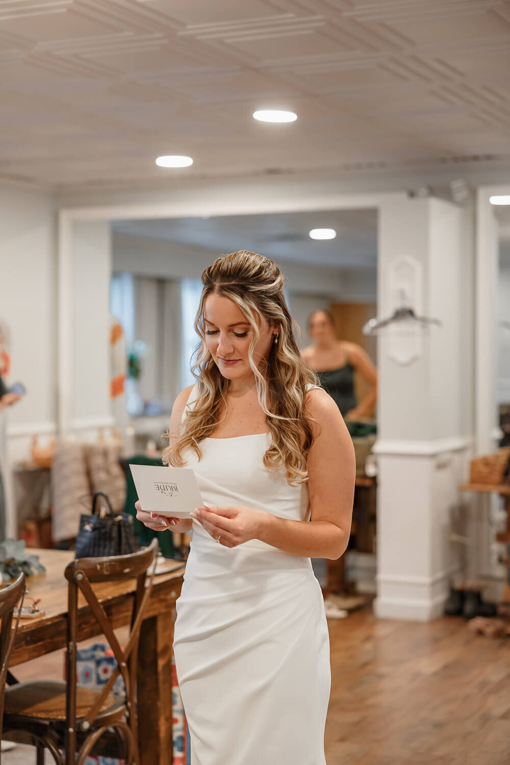 Heartwarming moment with the bride reading a letter from her soon to be husband during a wedding in Colorado Springs, captured by Michelle Betz Photography.