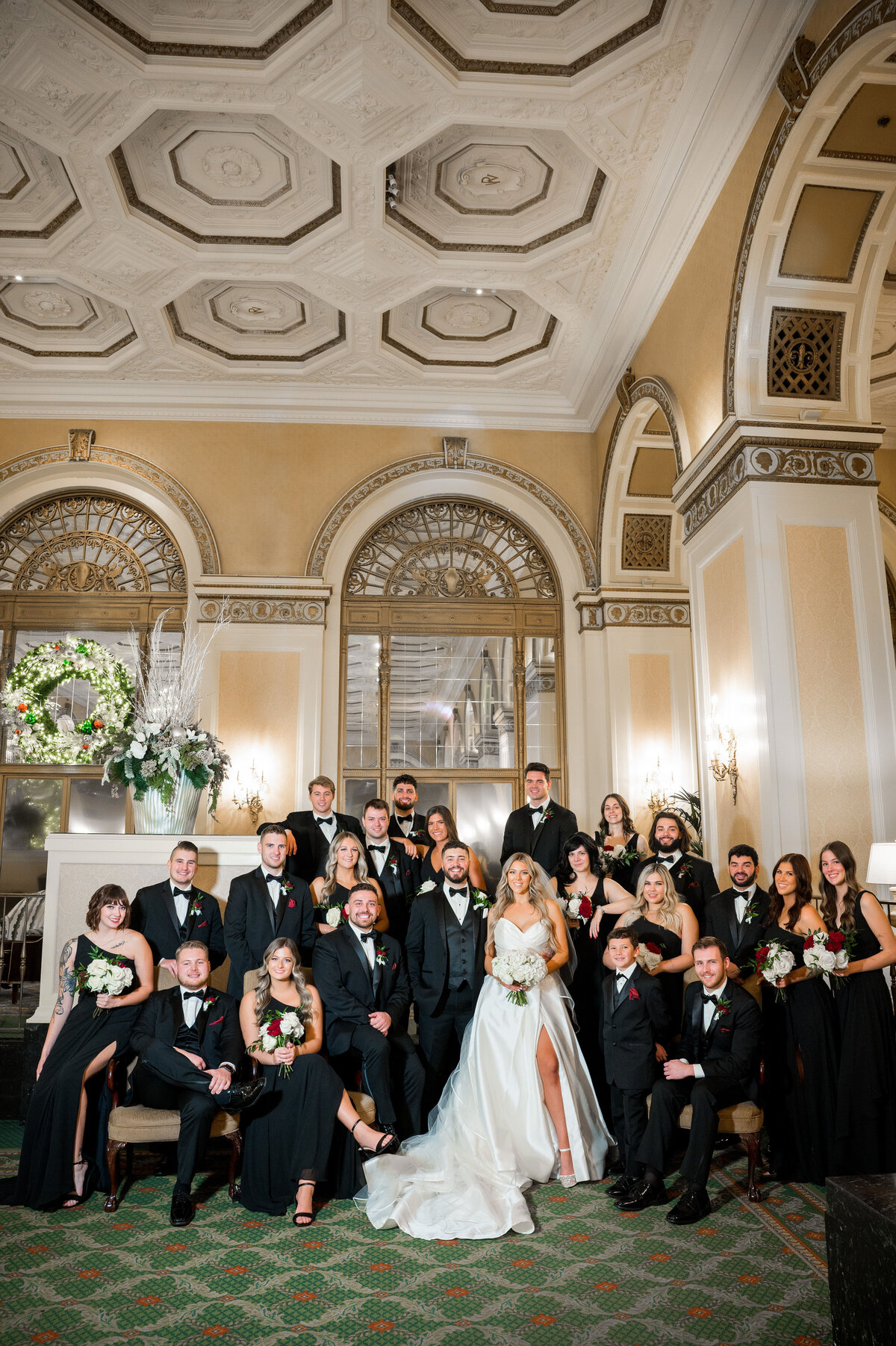 wedding party bridesmaids and groomsmen photo in lobby of omni william penn hotel