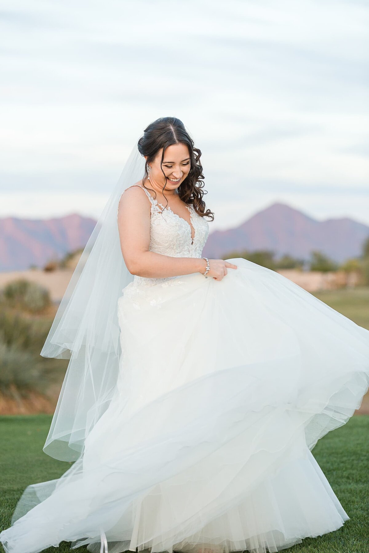Phoenix-Wedding-Photographer-and-Videographer-McDowell-Mountain-Golf-Club-bride-twirling-IncWed-1595