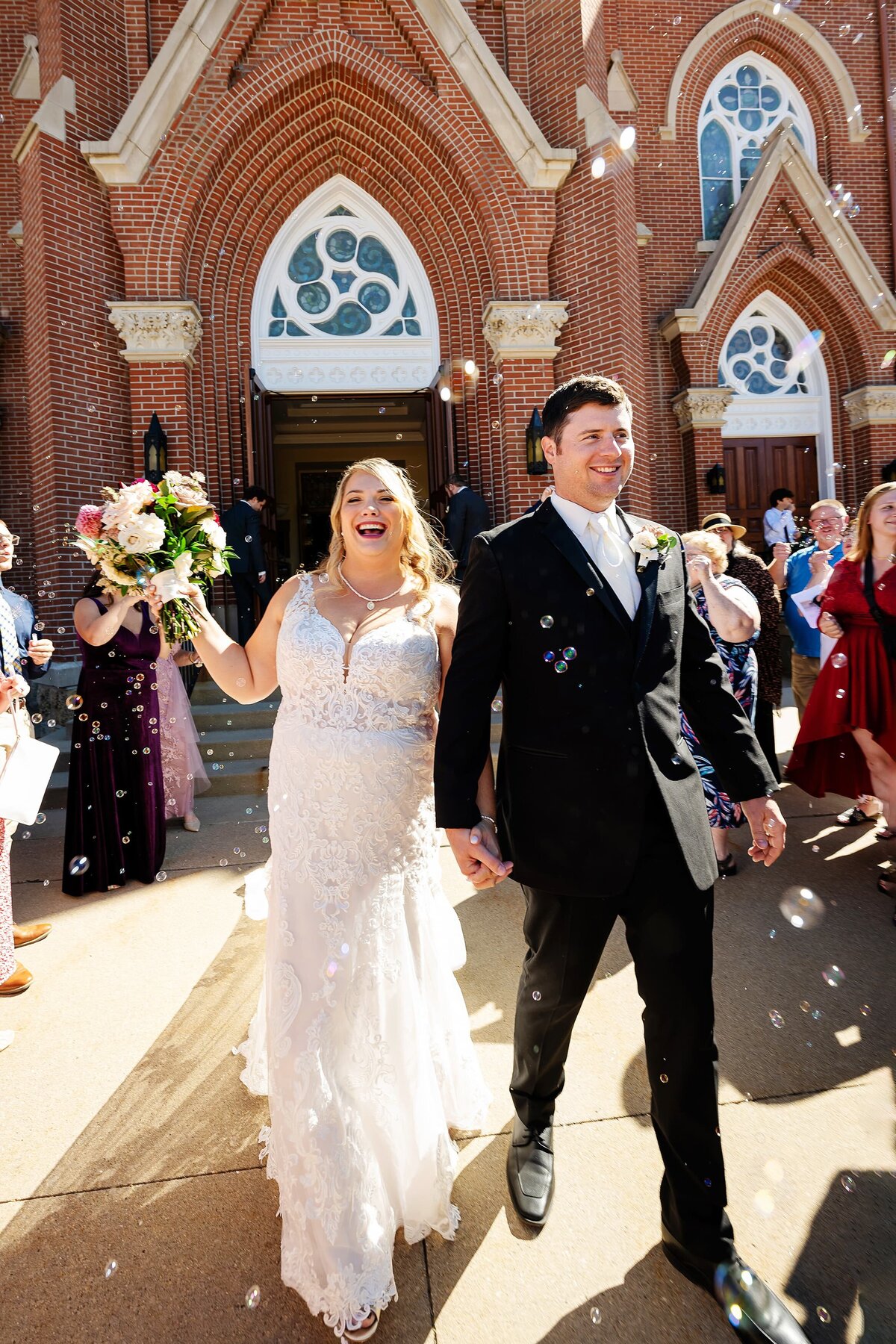 wedding couple exiting the church