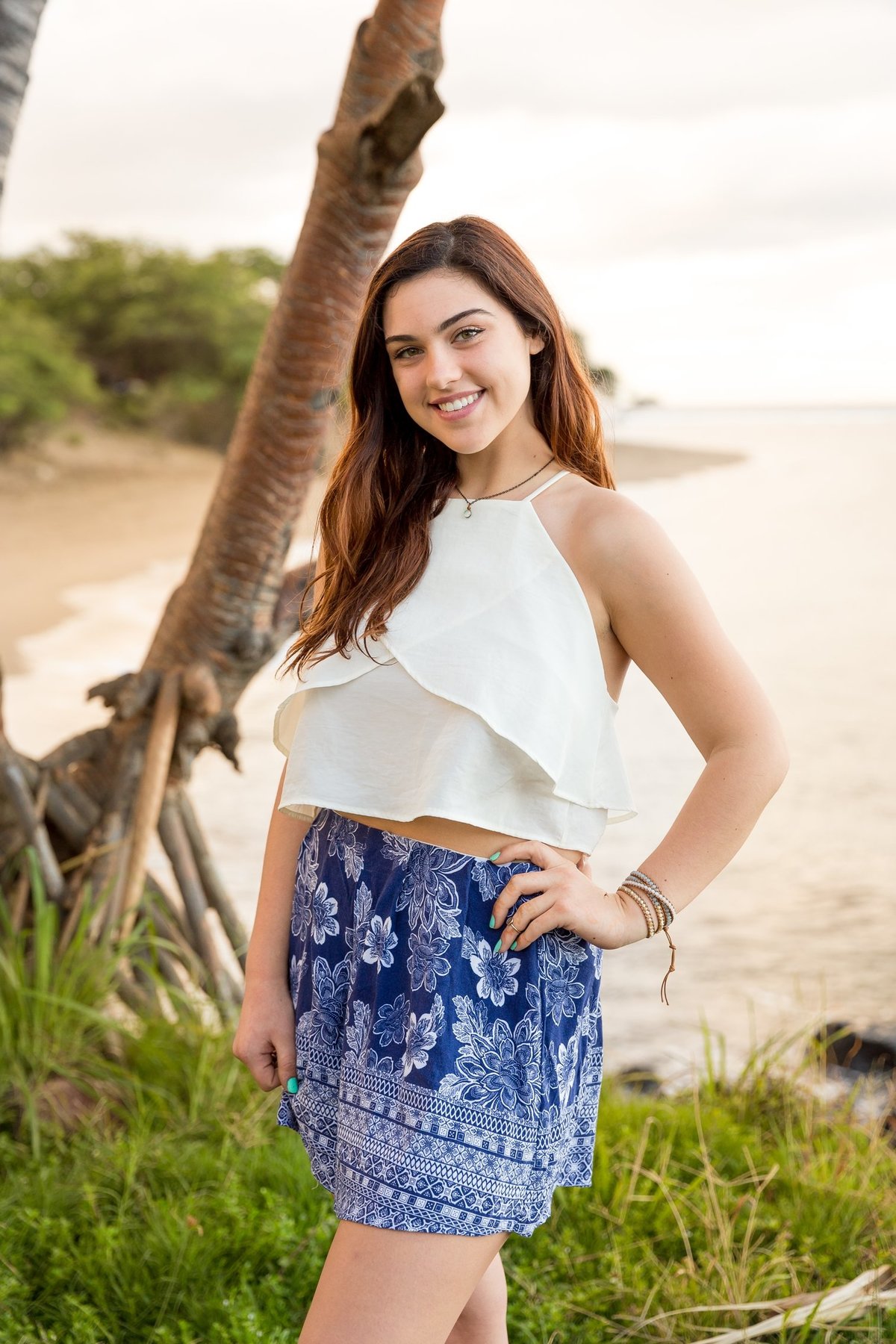 Capture Aloha Photography, Maui Senior Portrait Photography Woman in White with blue skirt at the beach