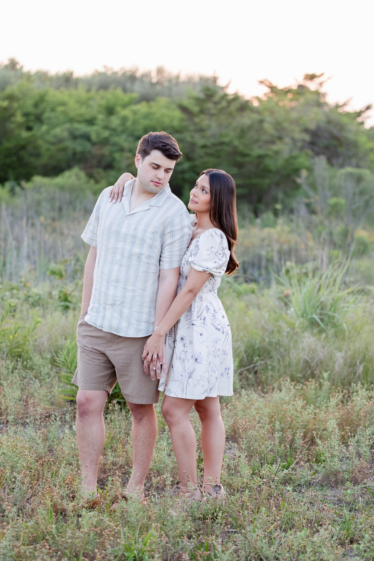 New Jersey Wedding Photographers	Spring Lake, NJ	Beach high grass field	Engagement Session	Summer August	Elegant Luxury Artistic Modern Editorial Light and Airy Natural Chic Stylish Timeless Classy Classic Romantic Couture Fine Art Experienced Professional Love Couples Emotional Genuine Authentic Real Fashion Fairy Tale Dream Lovers Jersey Shore Intimate	Engagement Session Photos Portraits Image 36