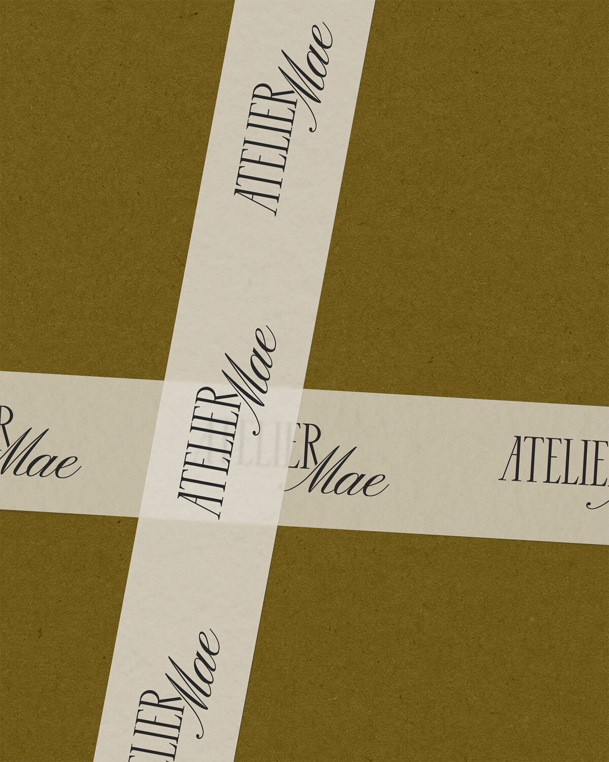 Atelier Mae logo tape op kraft achtergrond