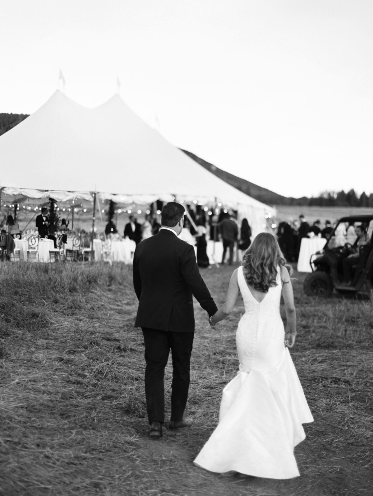 Bride and groom at tented wedding