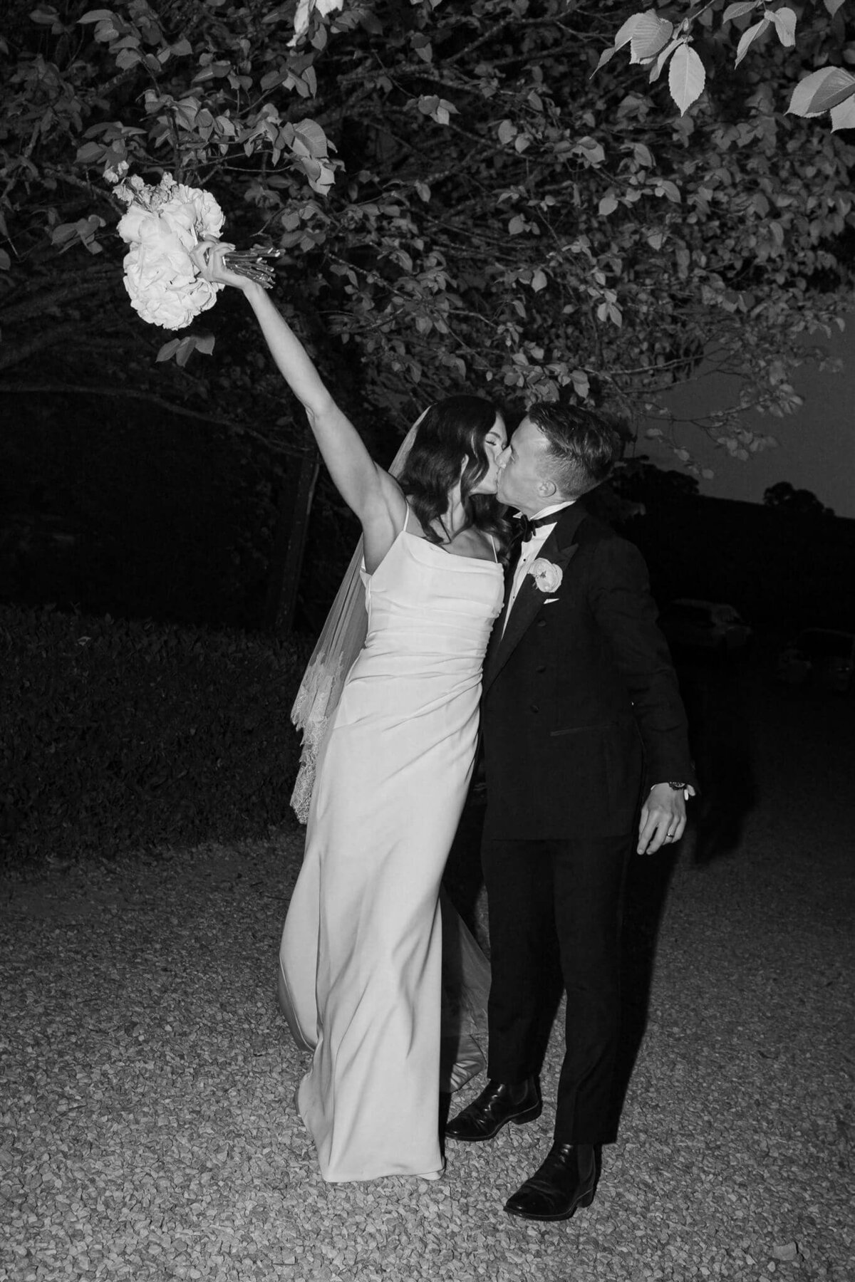 night time photo of a bride and groom on their wedding day