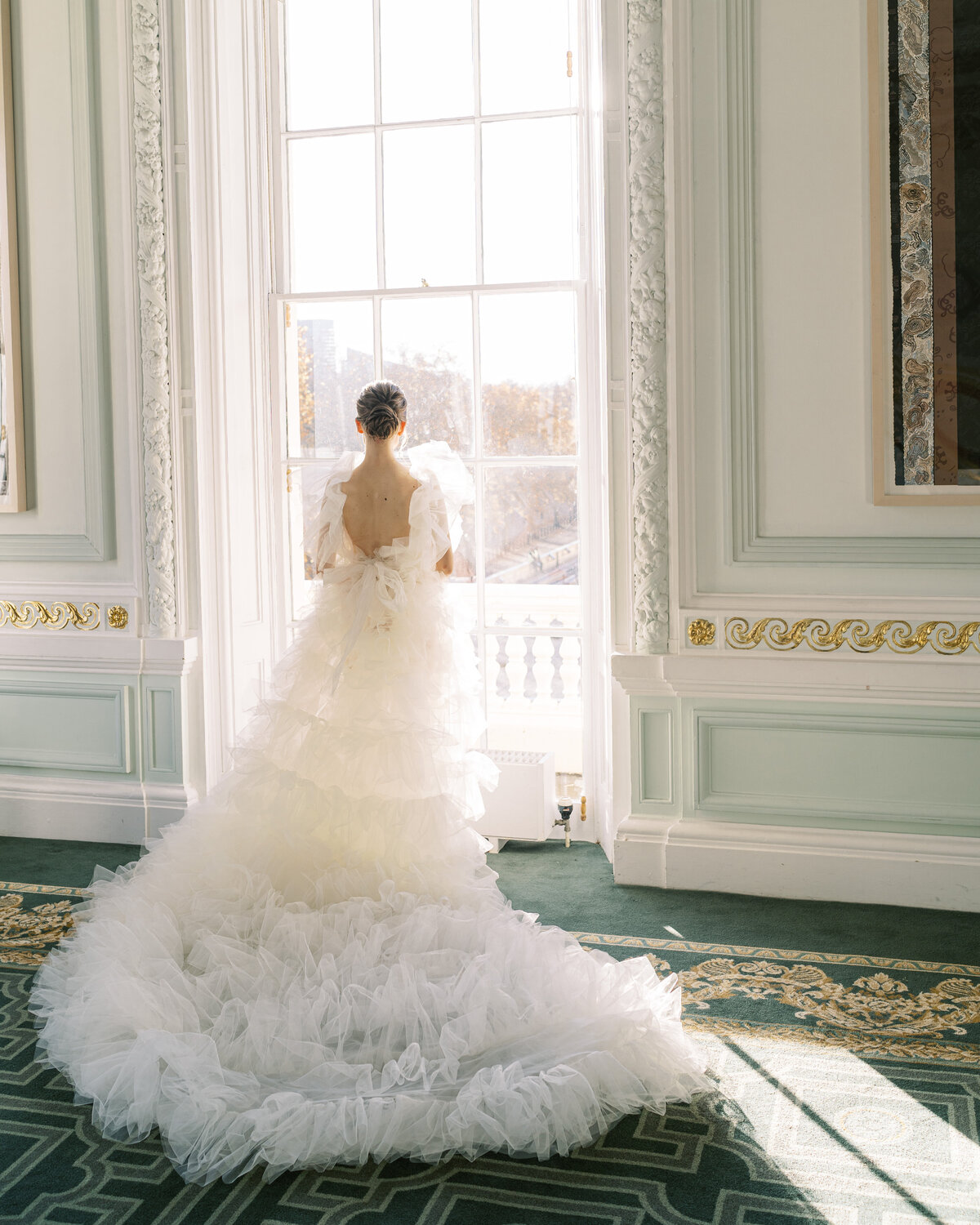 Bride in white tulle wedding dress at London wedding editorial