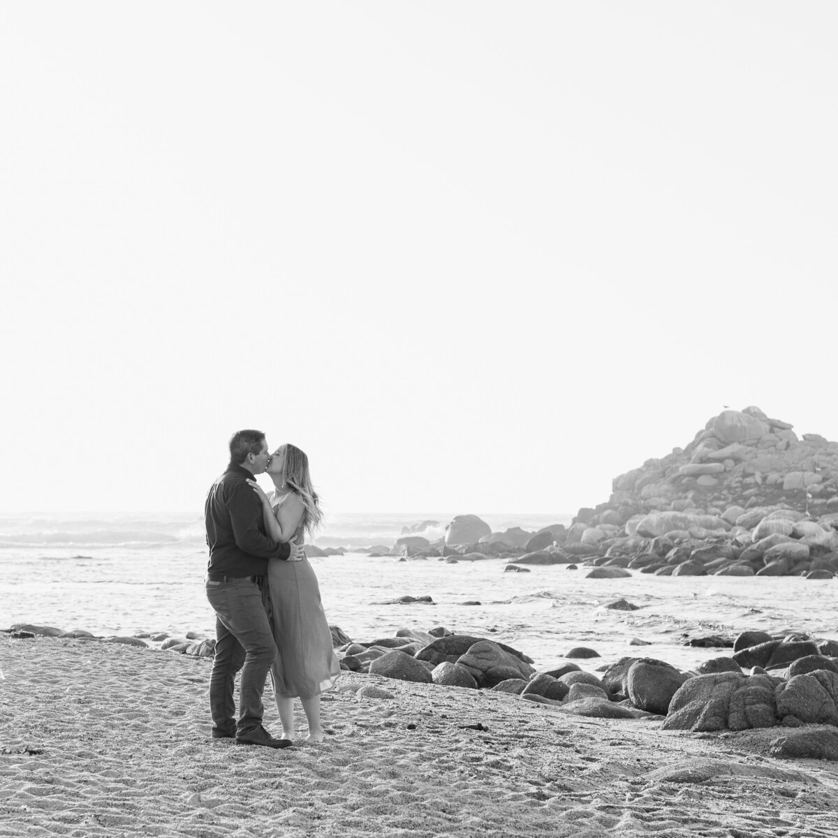 Black and white beach engagement photo