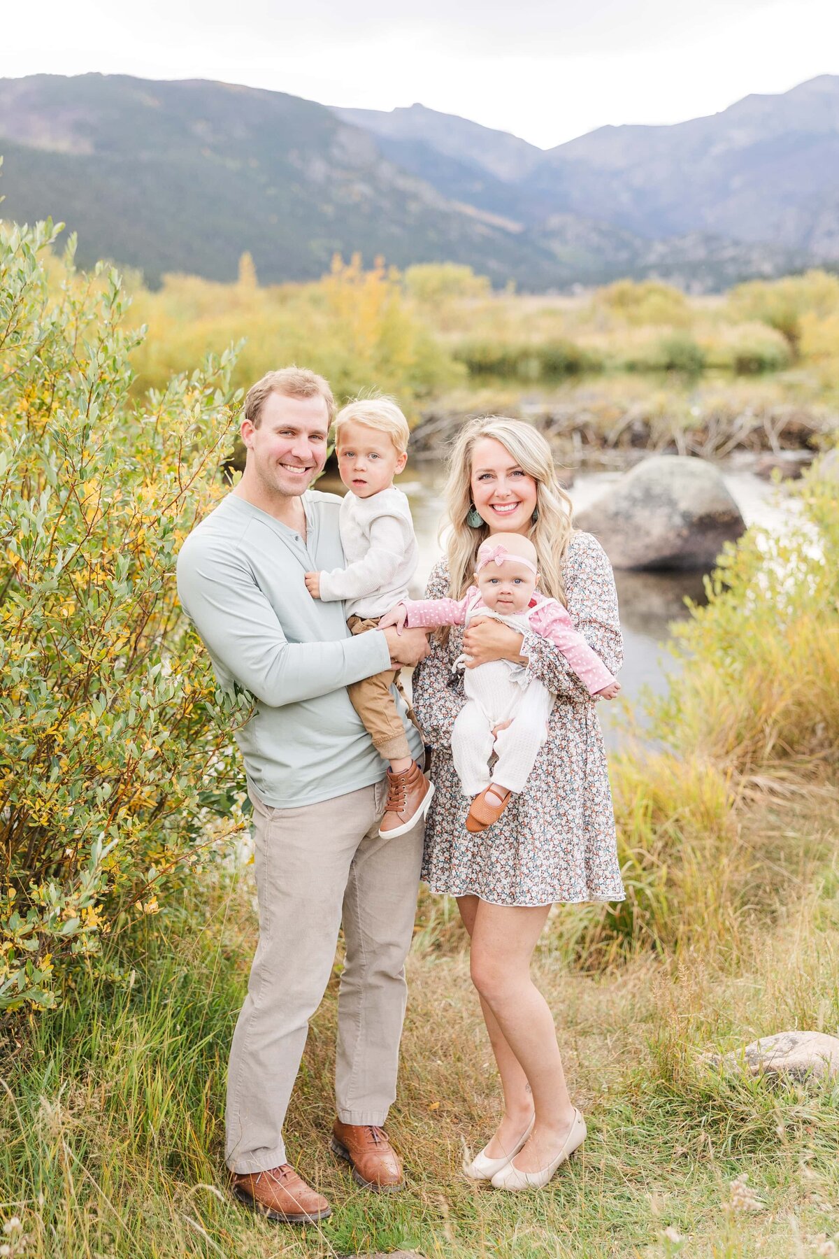 fall colors surround family in Estes Park, CO