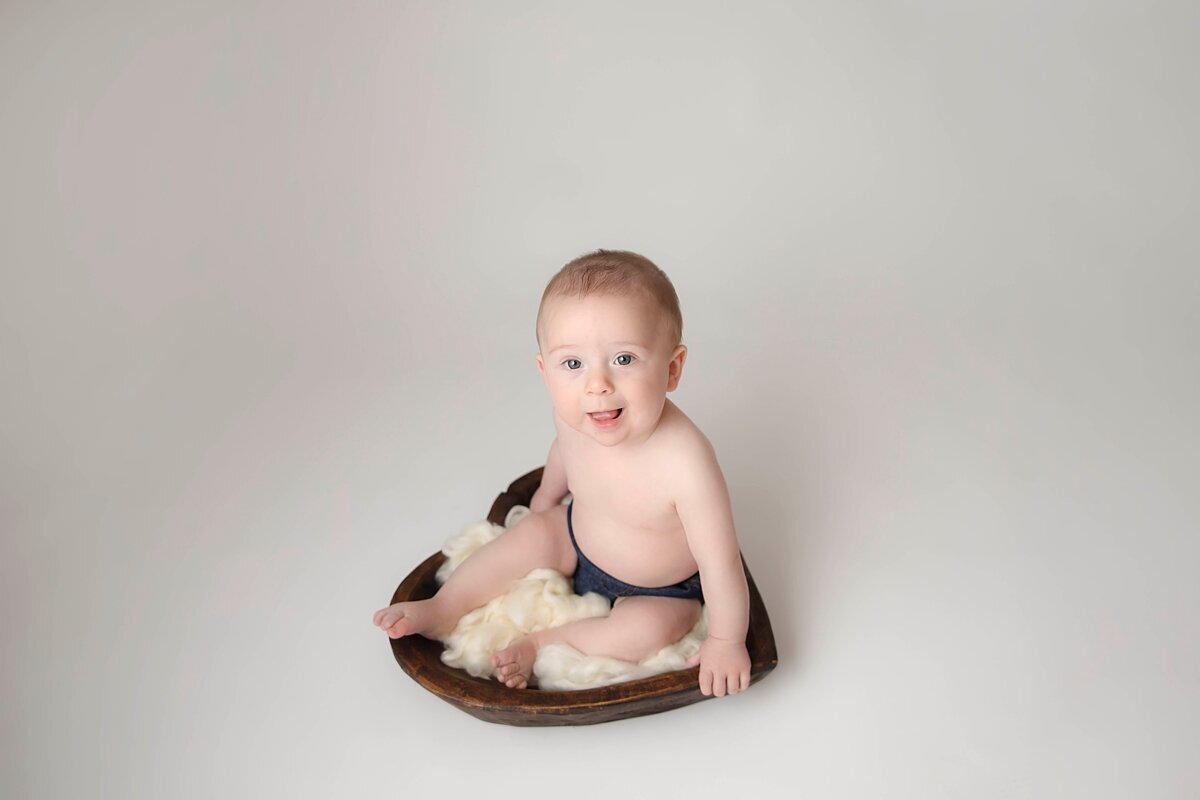 9 month old boy in heart bowl