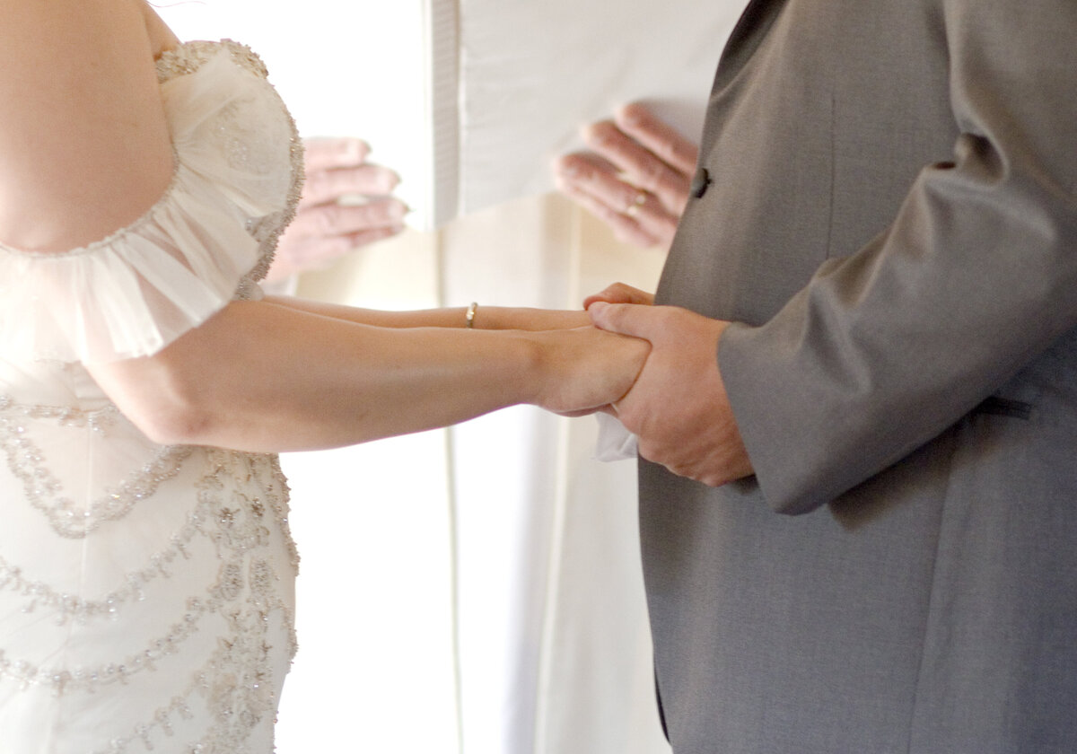ring exchange-vows-wedding ceremony-lost mission-robin rogers photography