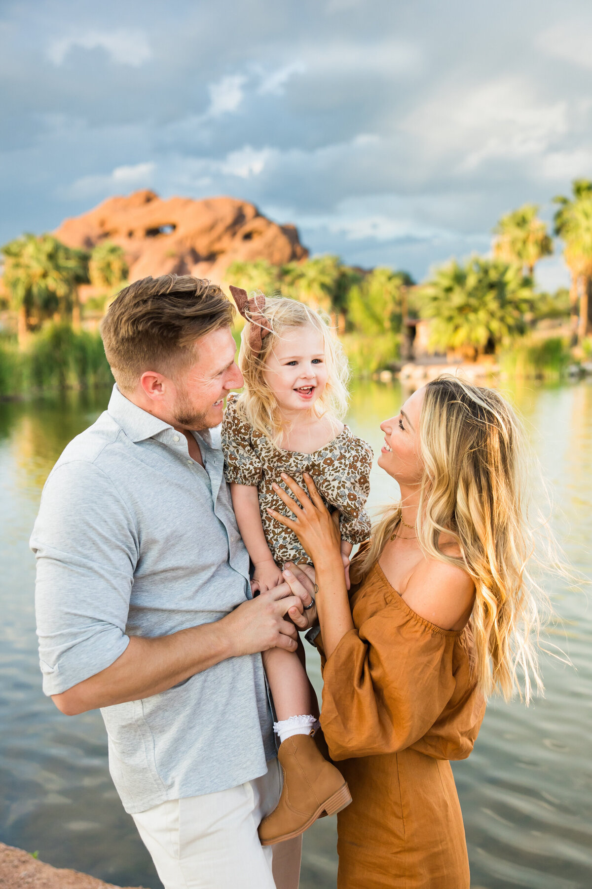 family laughing together in Papago Park
