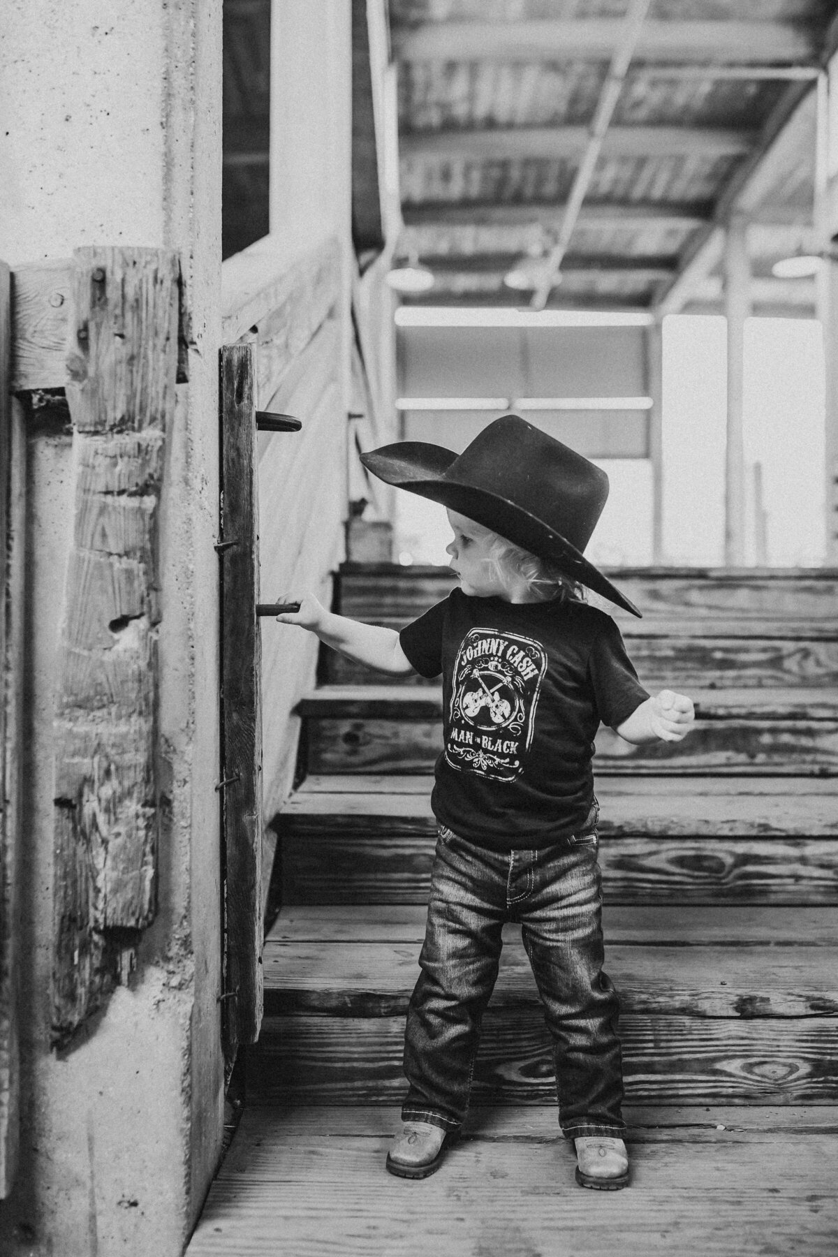 little cowboy in a country outfit