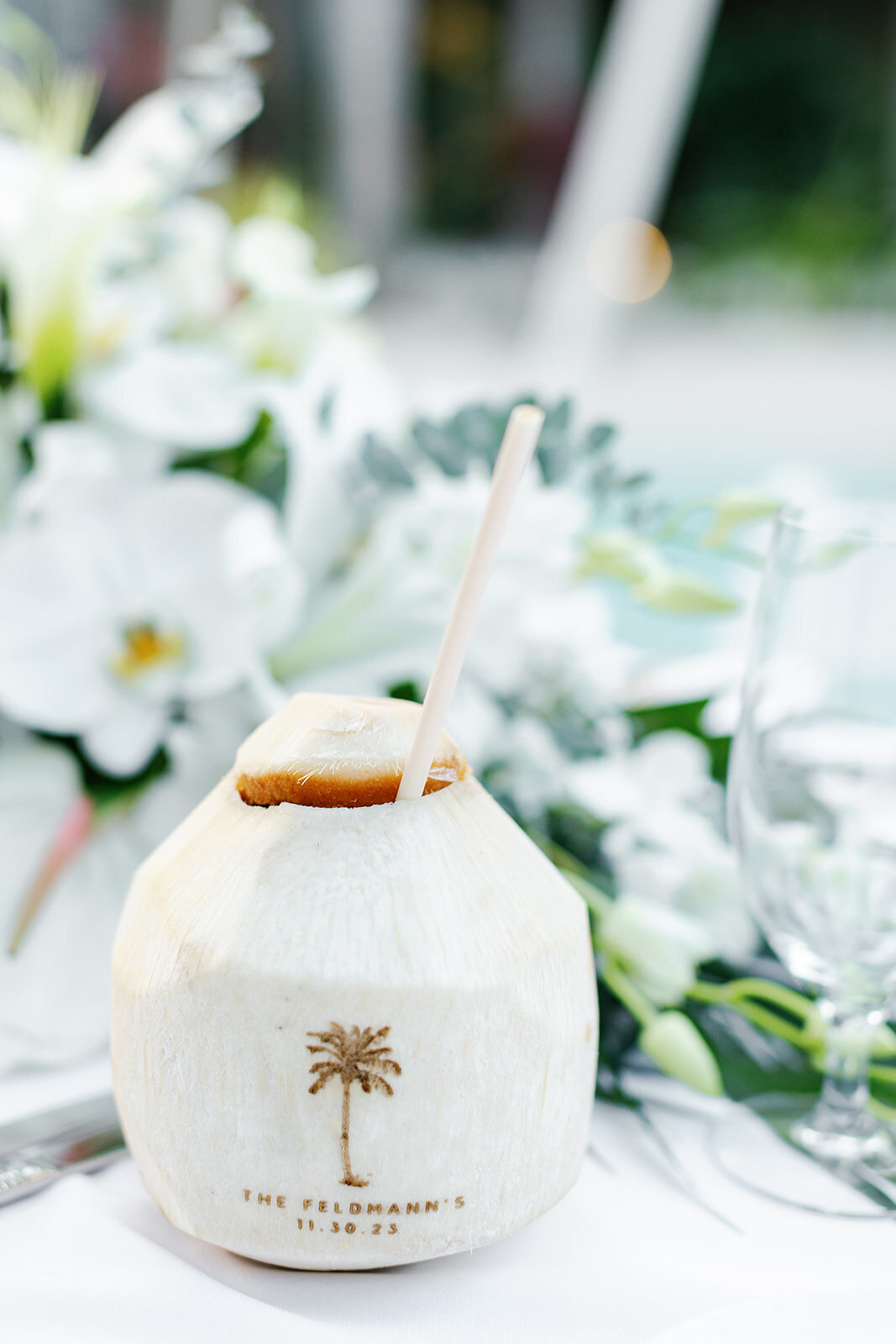 A fresh coconut with a custom engraving, a tropical detail at Monica and Austyn’s Florida Keys destination wedding.