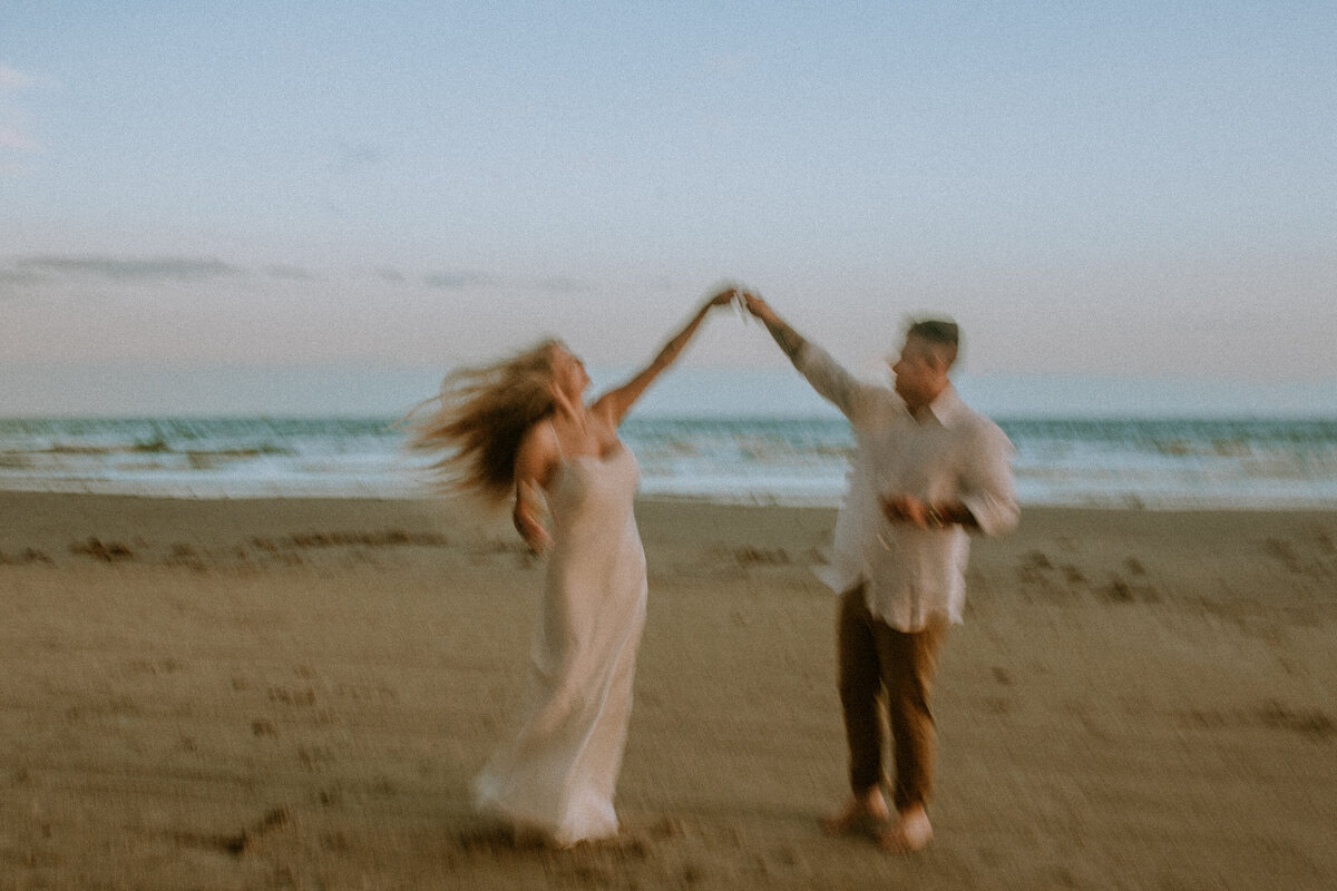 Amidst the serenity of Galveston's coastline, I had the honor of photographing an intimate elopement where the couple's love shone as brightly as the sun above. With their toes in the sand and the ocean as their witness, they exchanged heartfelt vows, creating a timeless moment of connection and romance.