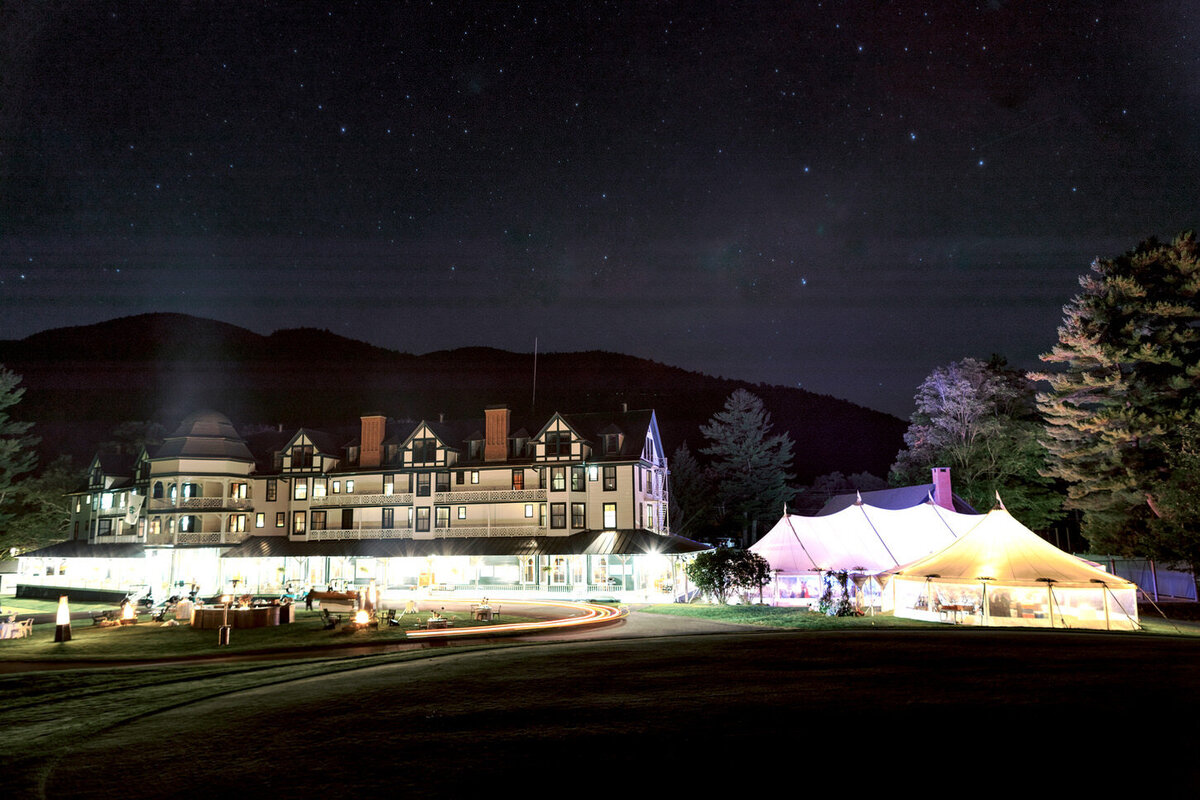 adirondack-mountain-wedding-42-guests-on-dance-floor-celebrating-with-joyful-energy-at-adirondack-mountain-wedding-jenny-fu-studio