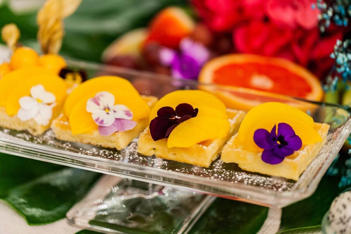 Miniture fruit desserts on a clear tray