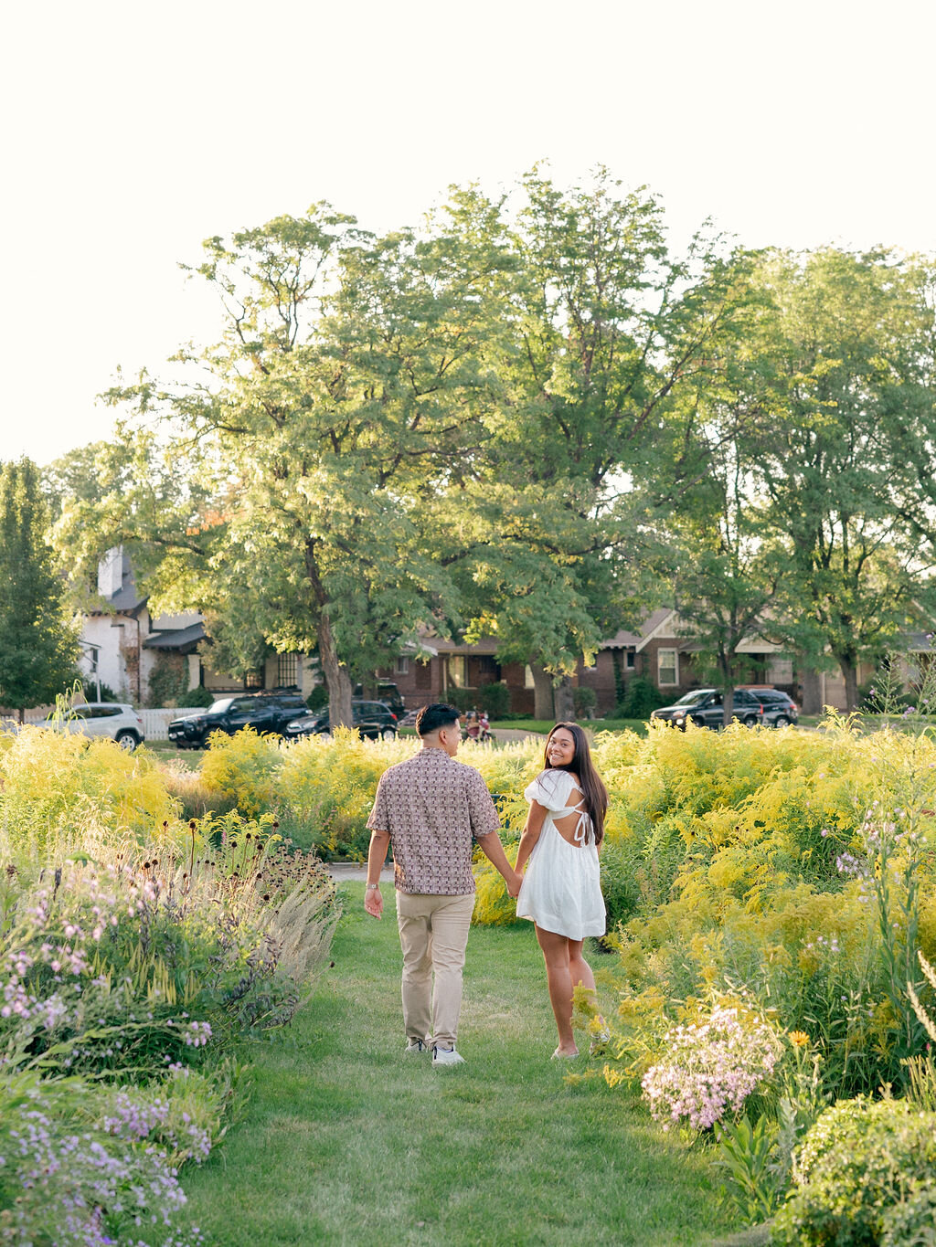 Colorful engagement photos in Denver, Colorado at Washington Park.