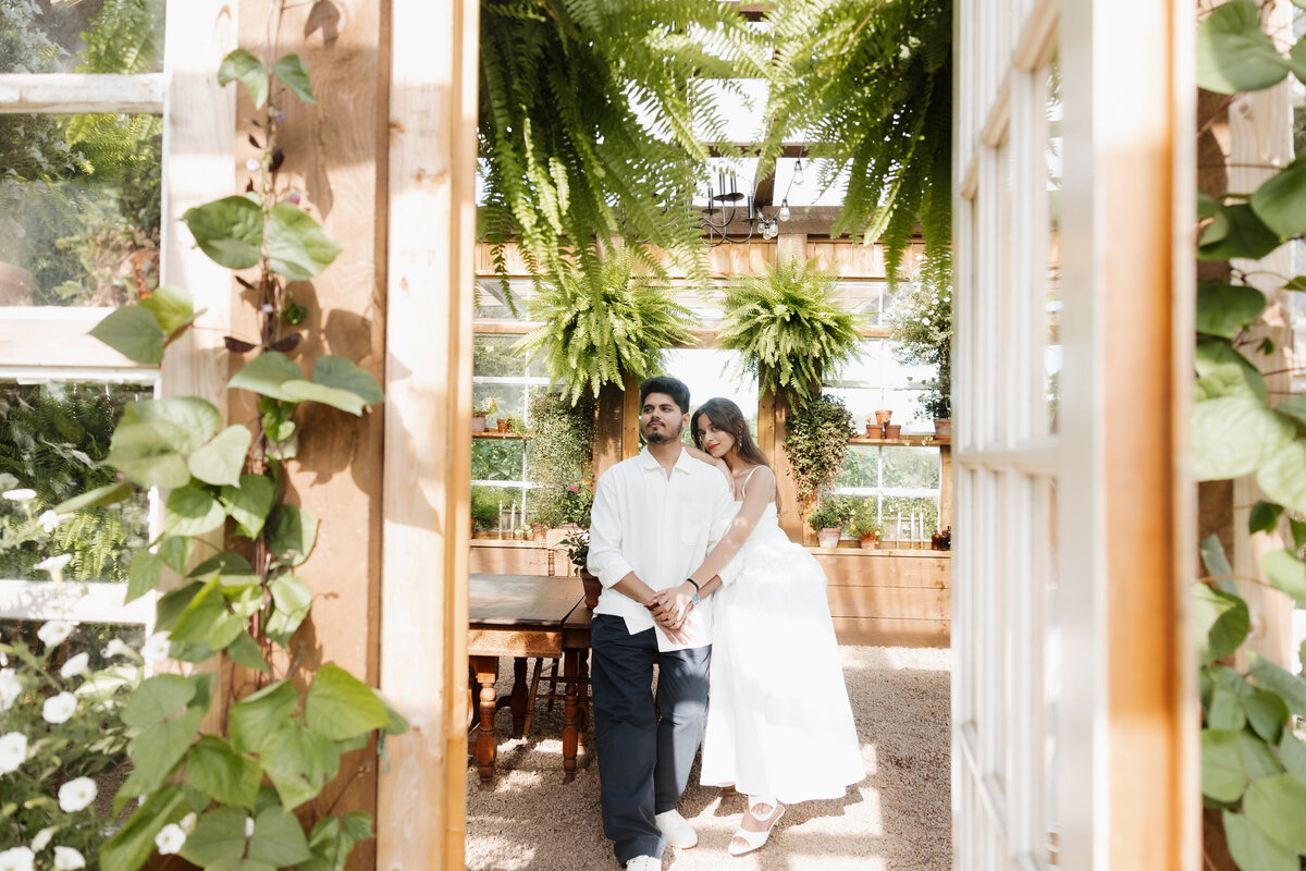 engagement photo in greenhouse venue
