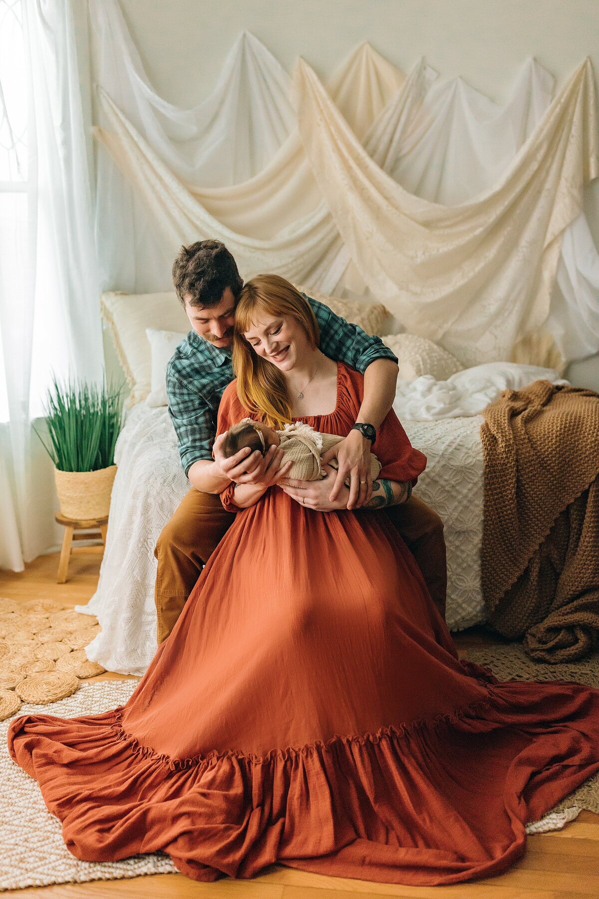 Mom and dad at newborn photography studio in Harrisonburg, VA