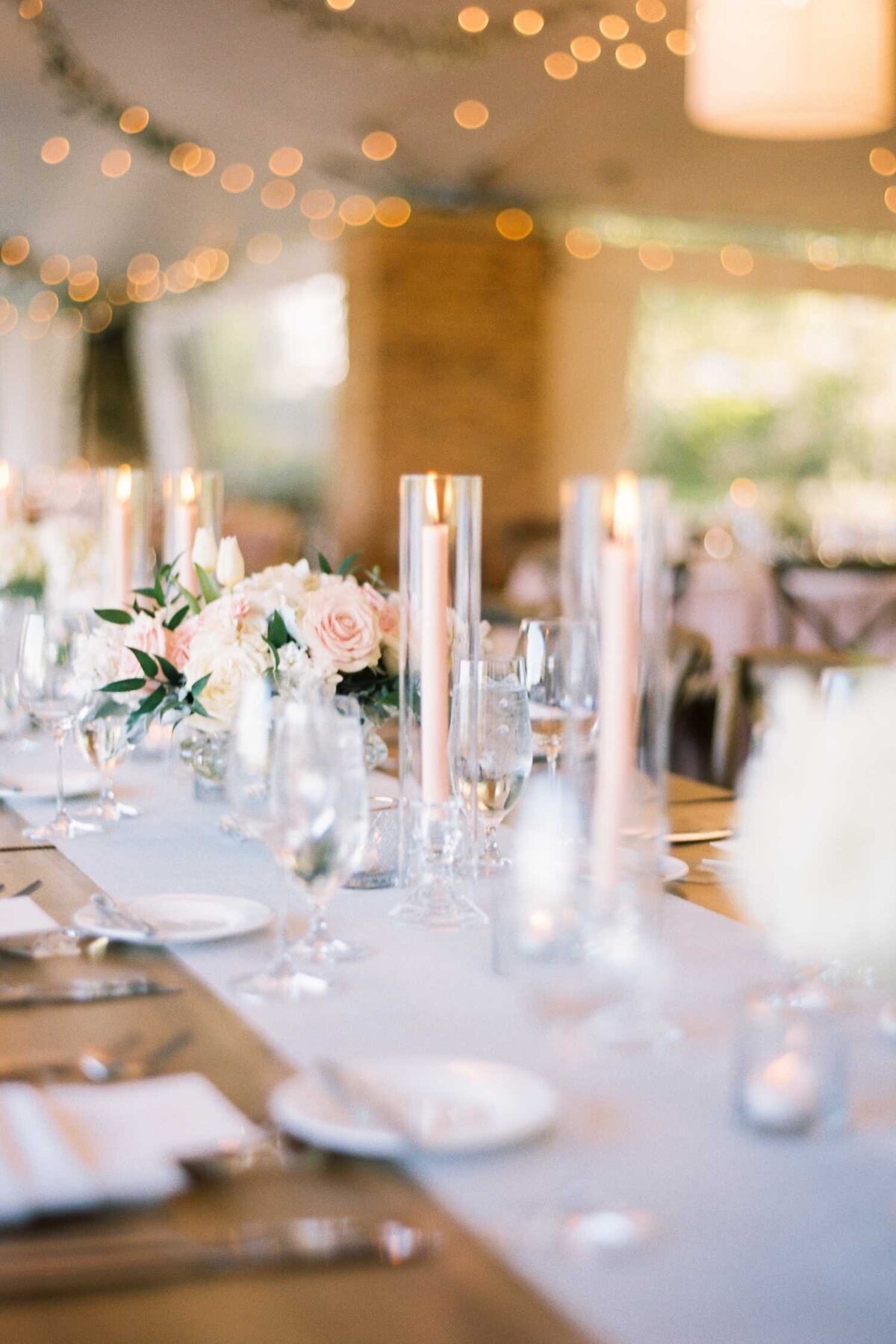 Farm Table Wedding Reception Design with Taper Candles at Luxury Chicago North Shore Garden Wedding Venue